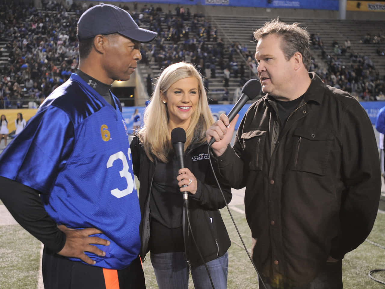 Eric Stonestreet, blue jersey, stadium field, HD Desktop Wallpaper