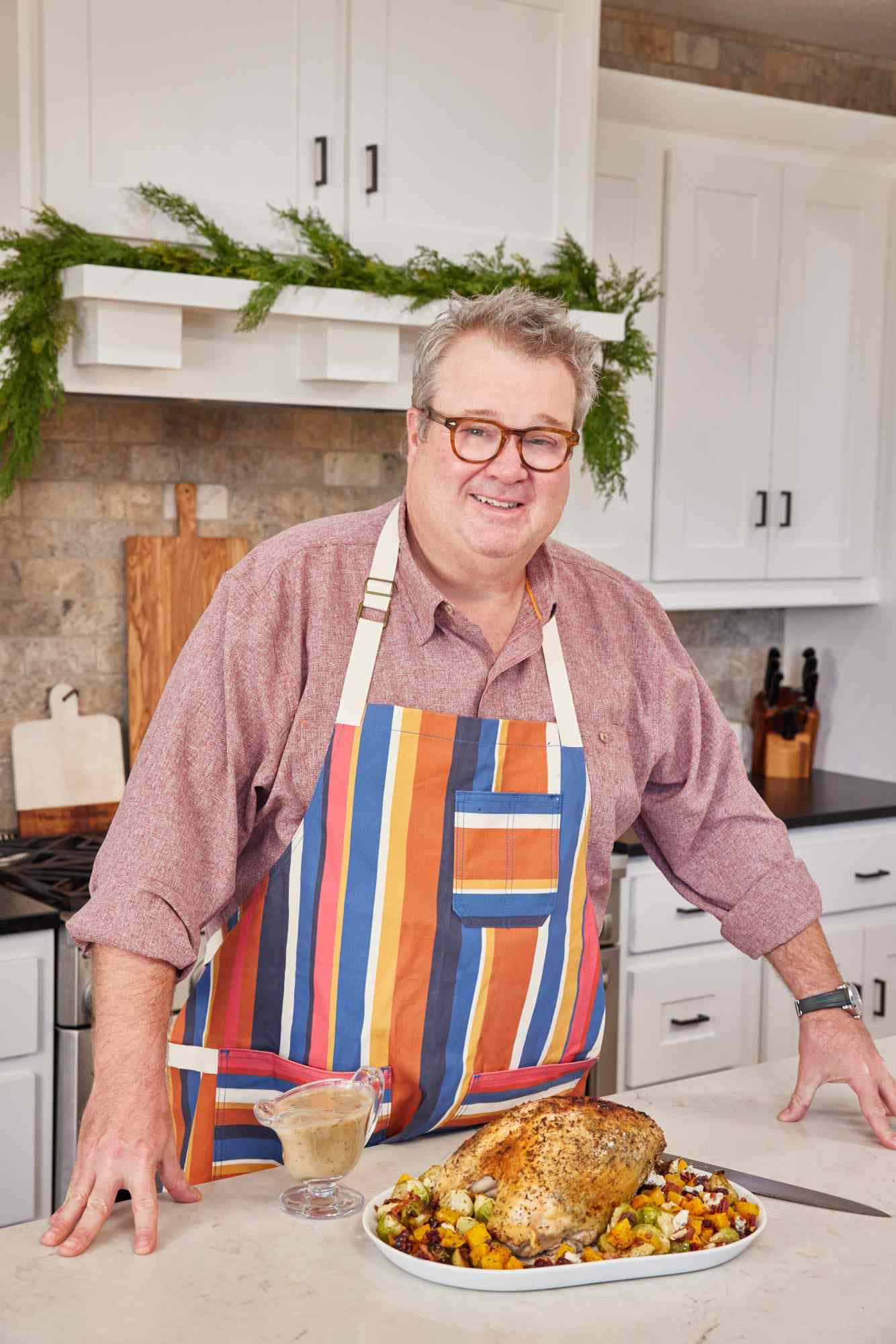 Eric Stonestreet, colorful striped apron, roasted turkey, Full HD Phone Wallpaper