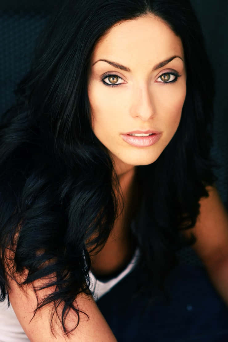 Erica Cerra, long dark hair, striking green eyes, SD Phone Wallpaper