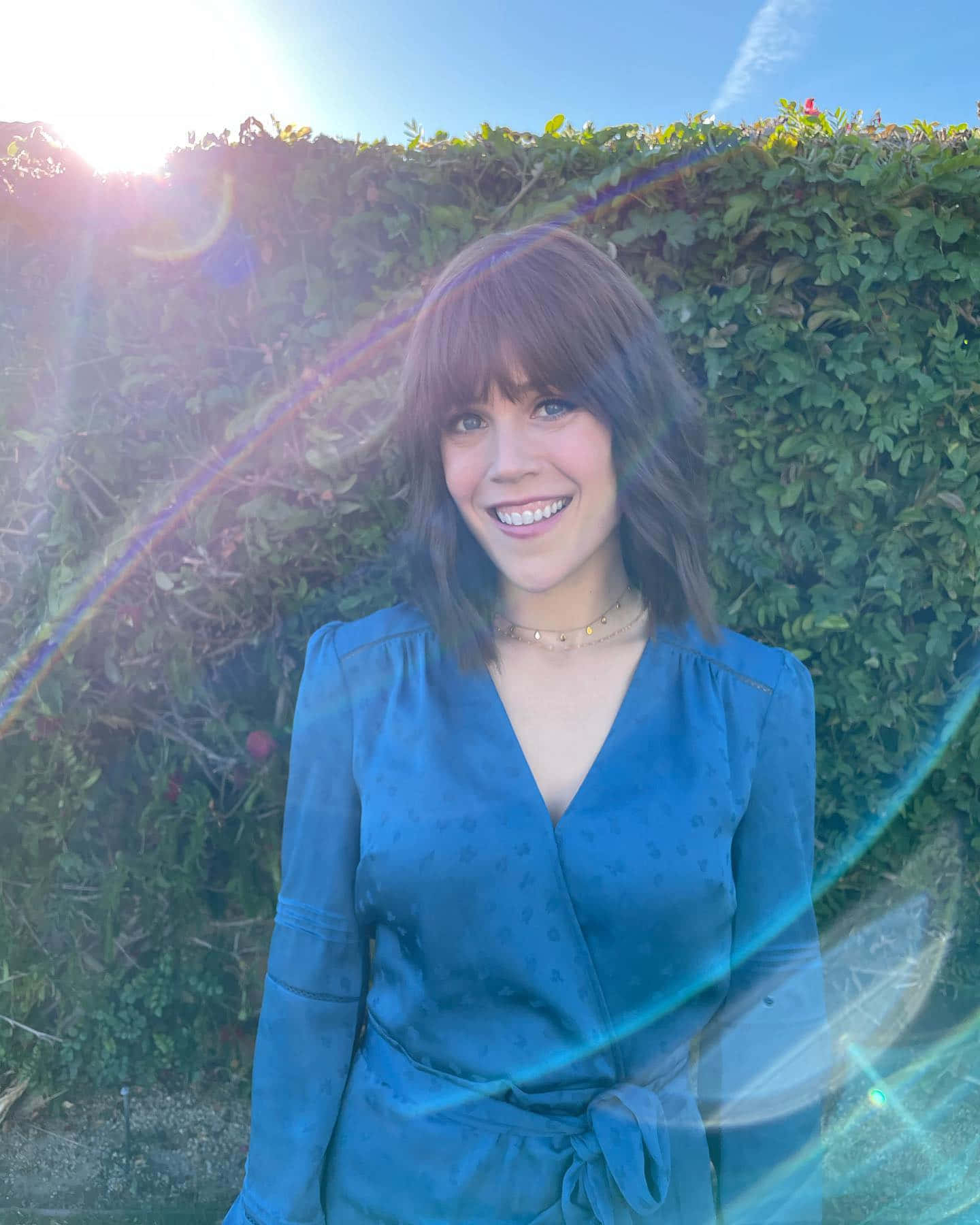 Erin Krakow, blue wrap dress, sunlit green hedge, HD Phone Wallpaper