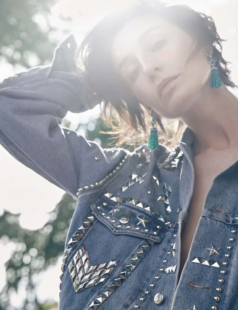 Erin O'Connor, studded denim jacket, sunlight backlighting, SD Phone Wallpaper