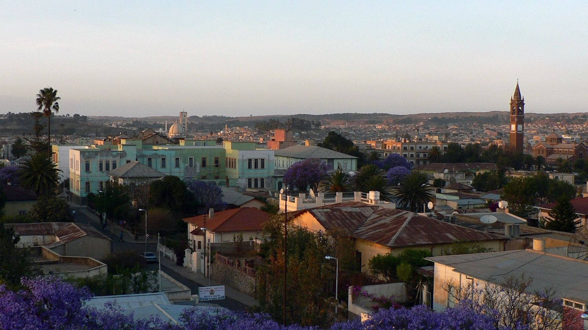 Eritrea, pastel buildings, purple jacaranda trees, Full HD Desktop Wallpaper