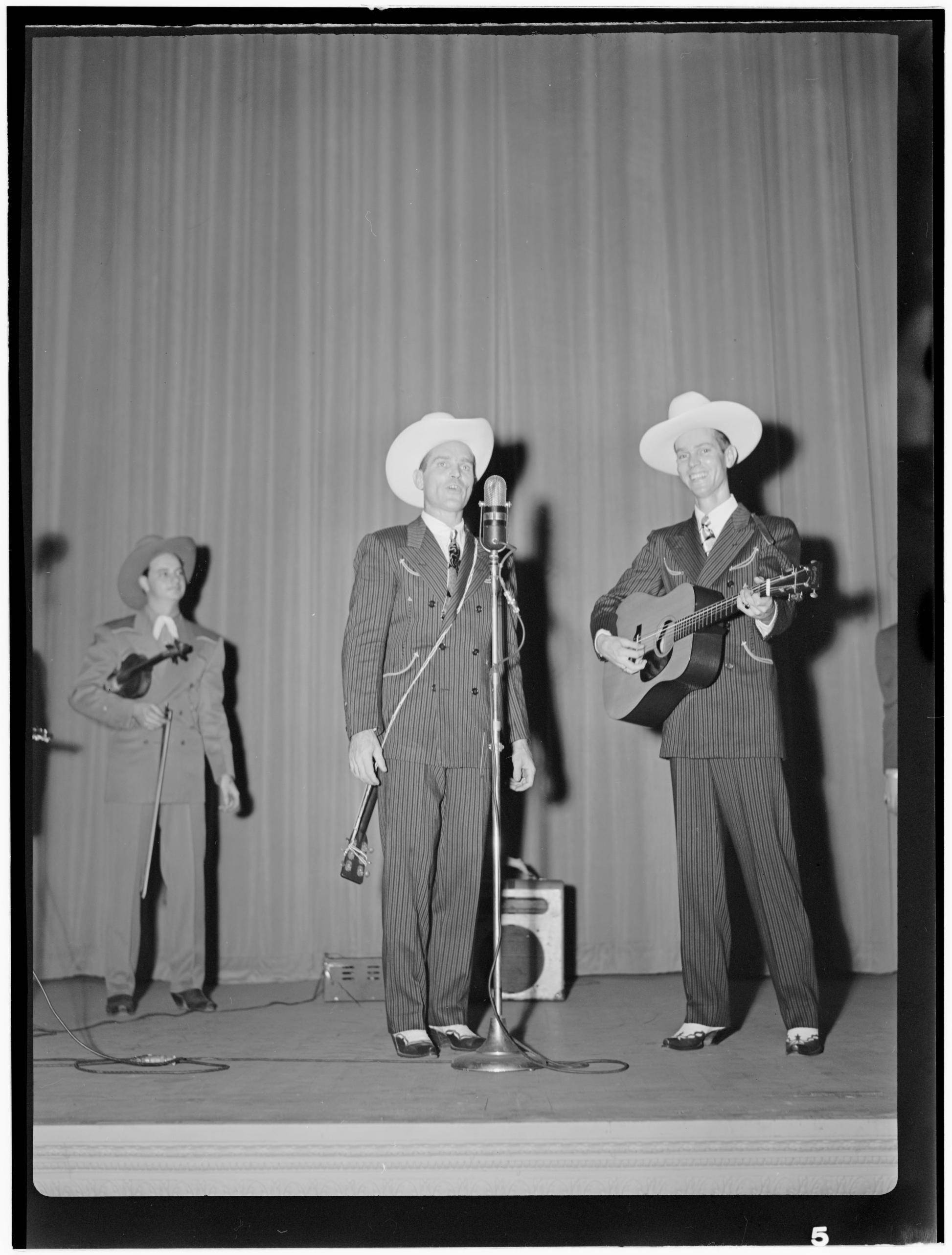 Ernest Tubb, cowboy hats, guitar, 2K Phone Wallpaper