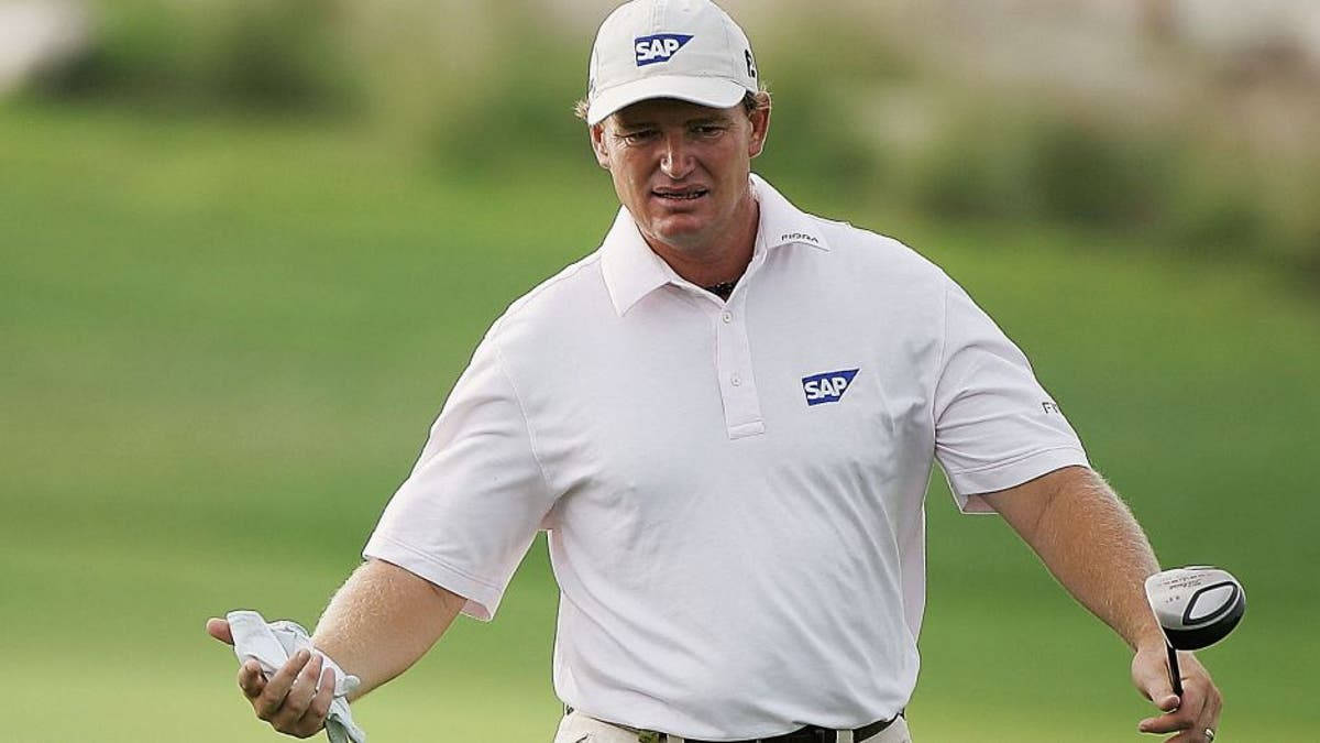 Ernie Els, golf club, white SAP polo, SD Desktop Wallpaper