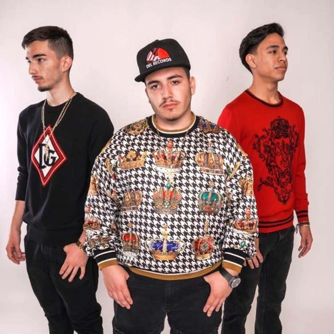 Eslabon Armado, three stylish young men, bold patterned sweaters, SD Desktop Wallpaper