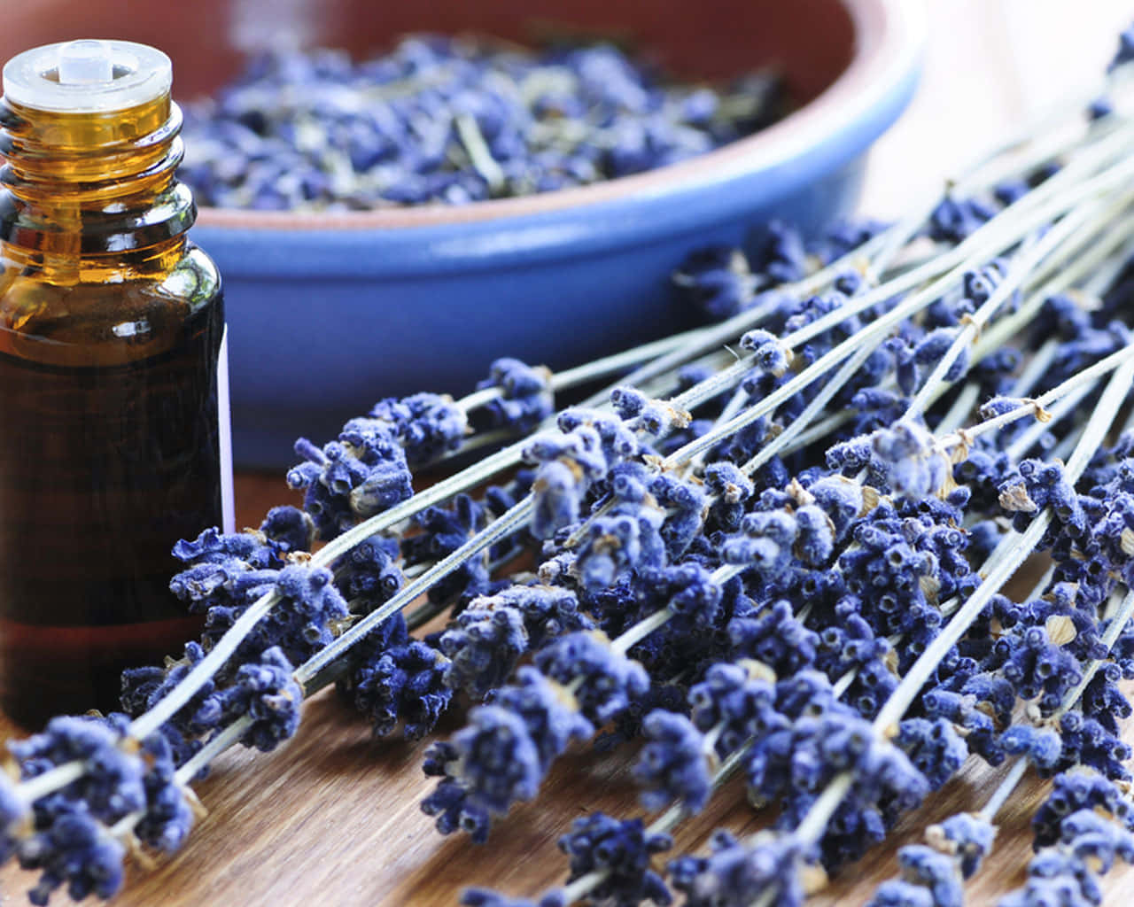 lavender sprigs, amber essential oil bottle, wooden surface, HD Desktop Wallpaper