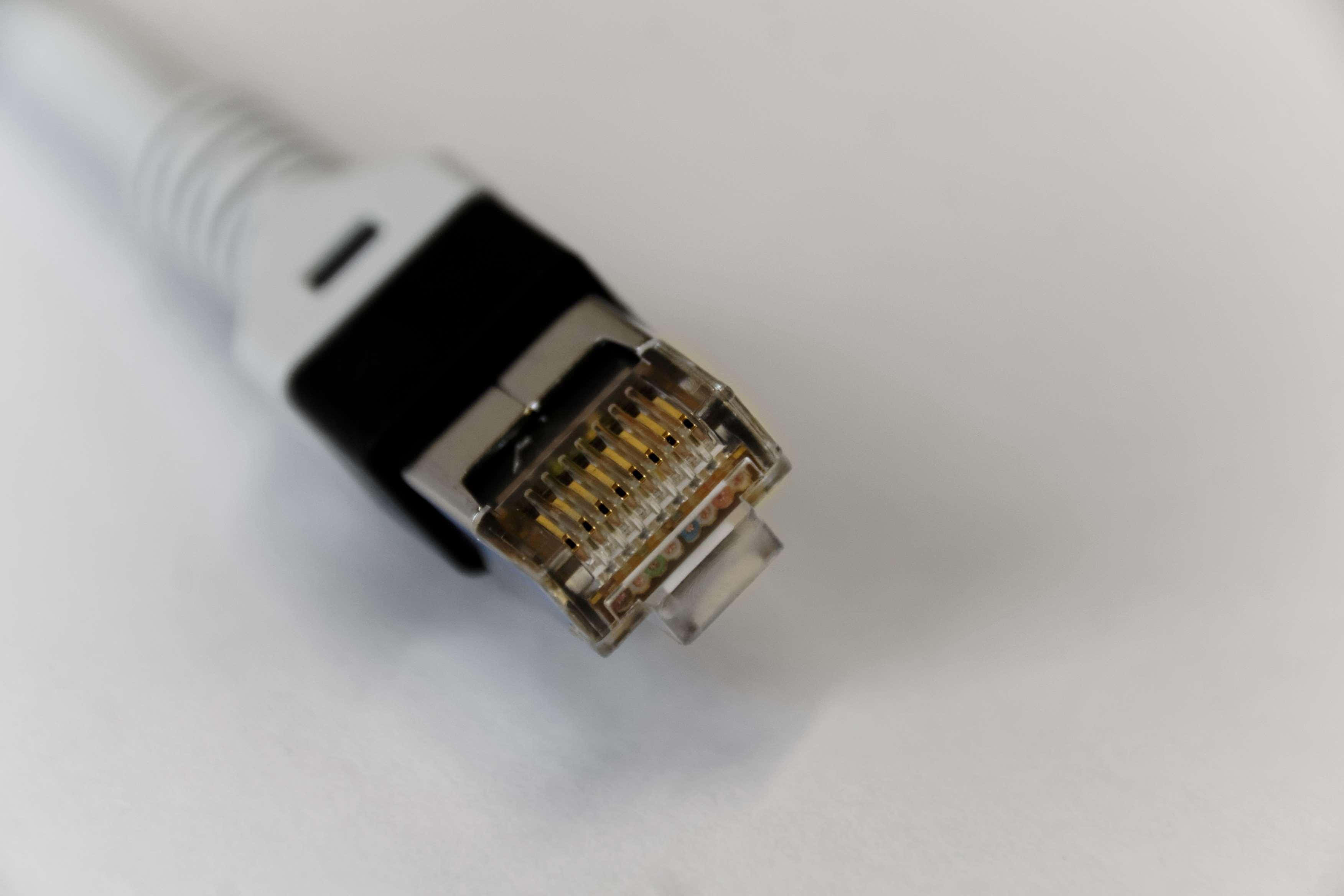 Ethernet, white ethernet cable connector, gold plated pins, 2K Desktop Wallpaper