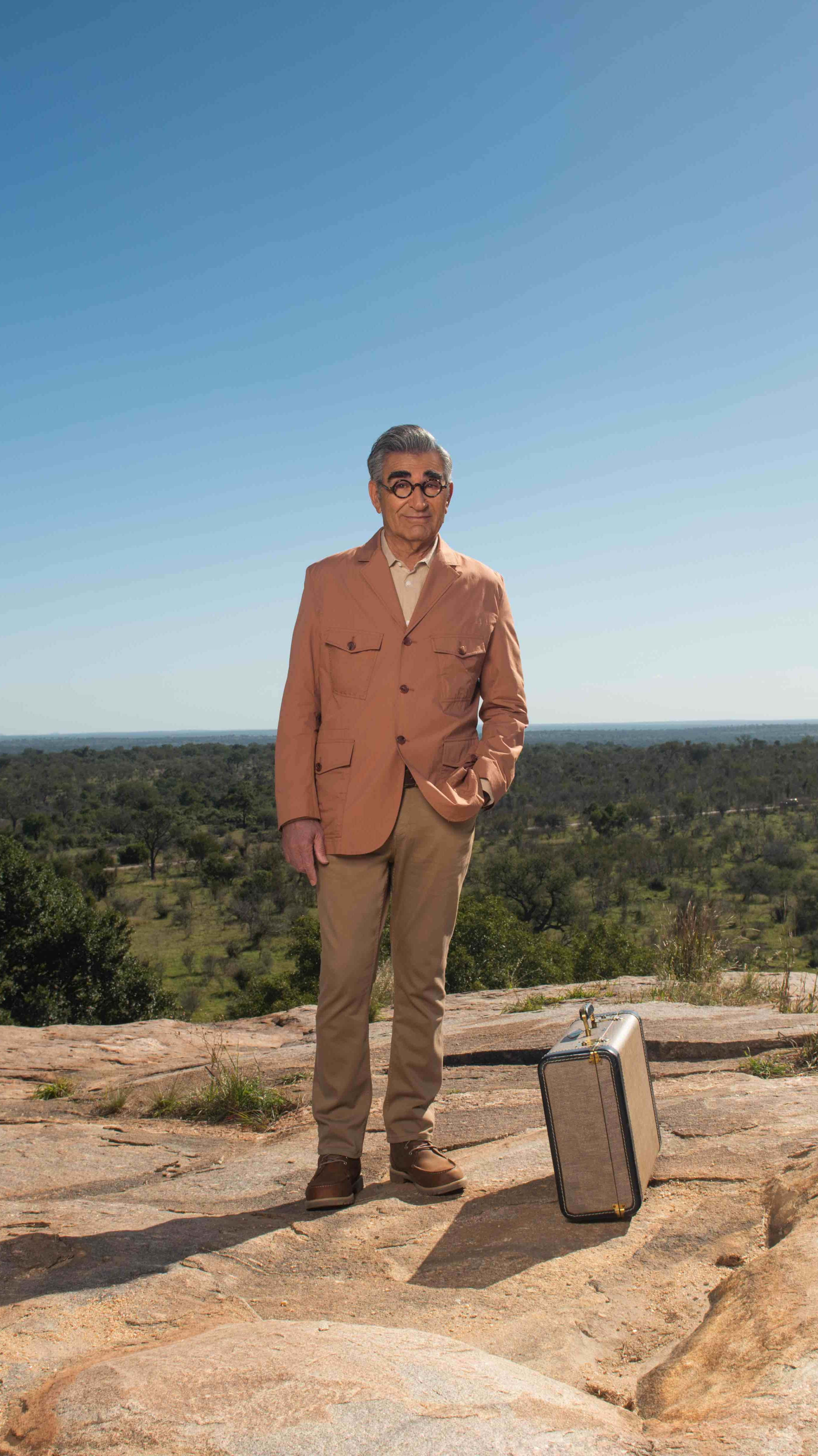 Eugene Levy, tan suit, vintage suitcase, 4K Phone Wallpaper