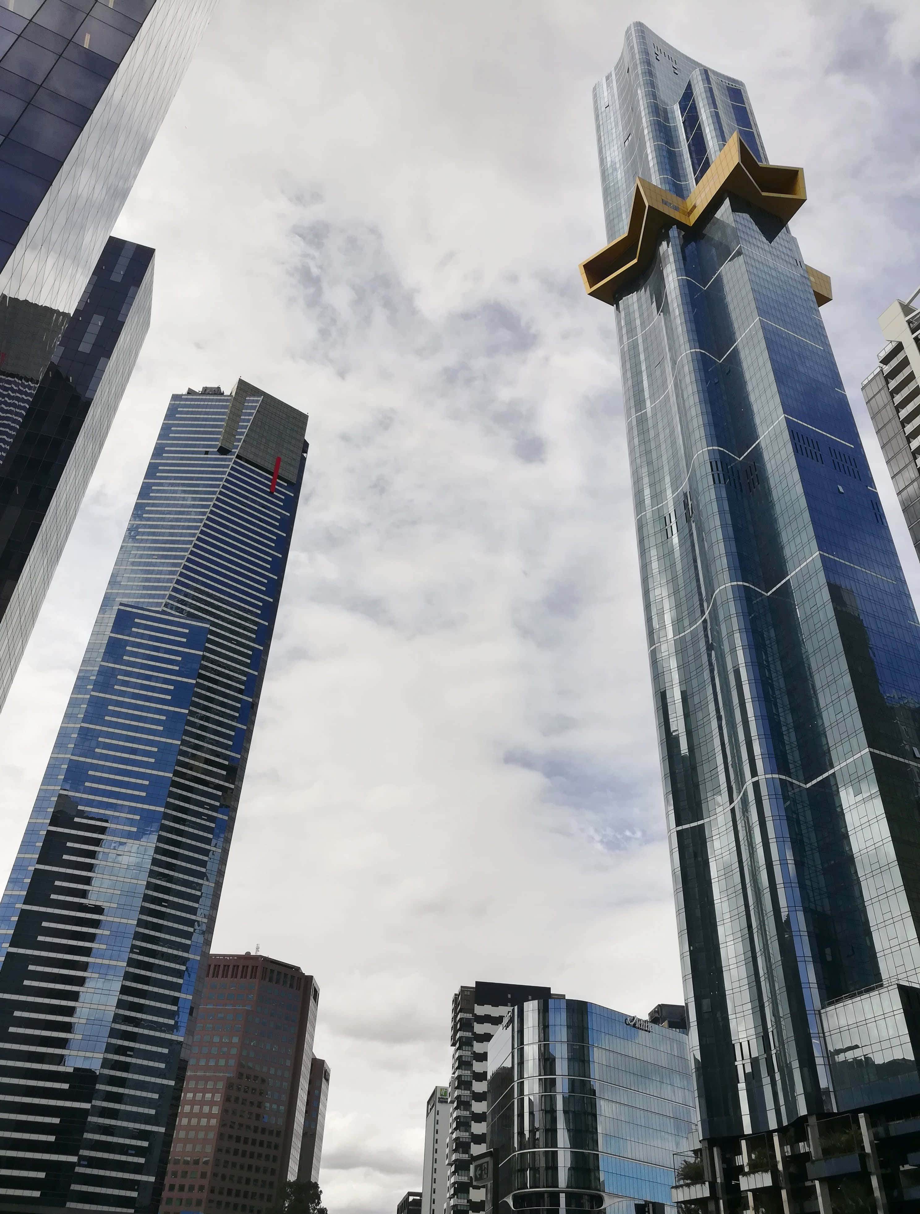 Eureka Tower, golden star sculpture, glass skyscrapers, 4K Phone Wallpaper