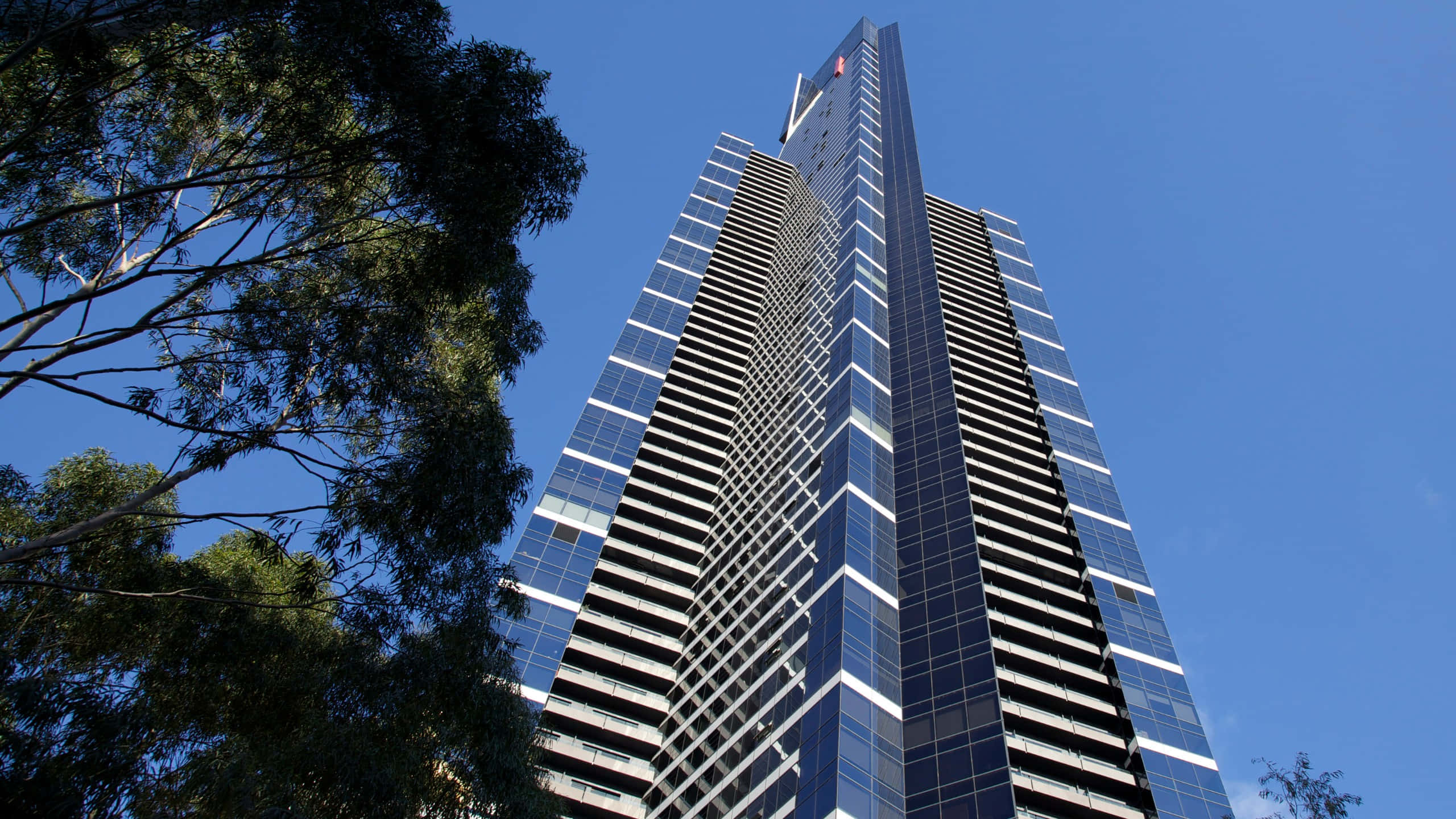 Eureka Tower, V-shaped top, clear blue sky, 2K Desktop Wallpaper