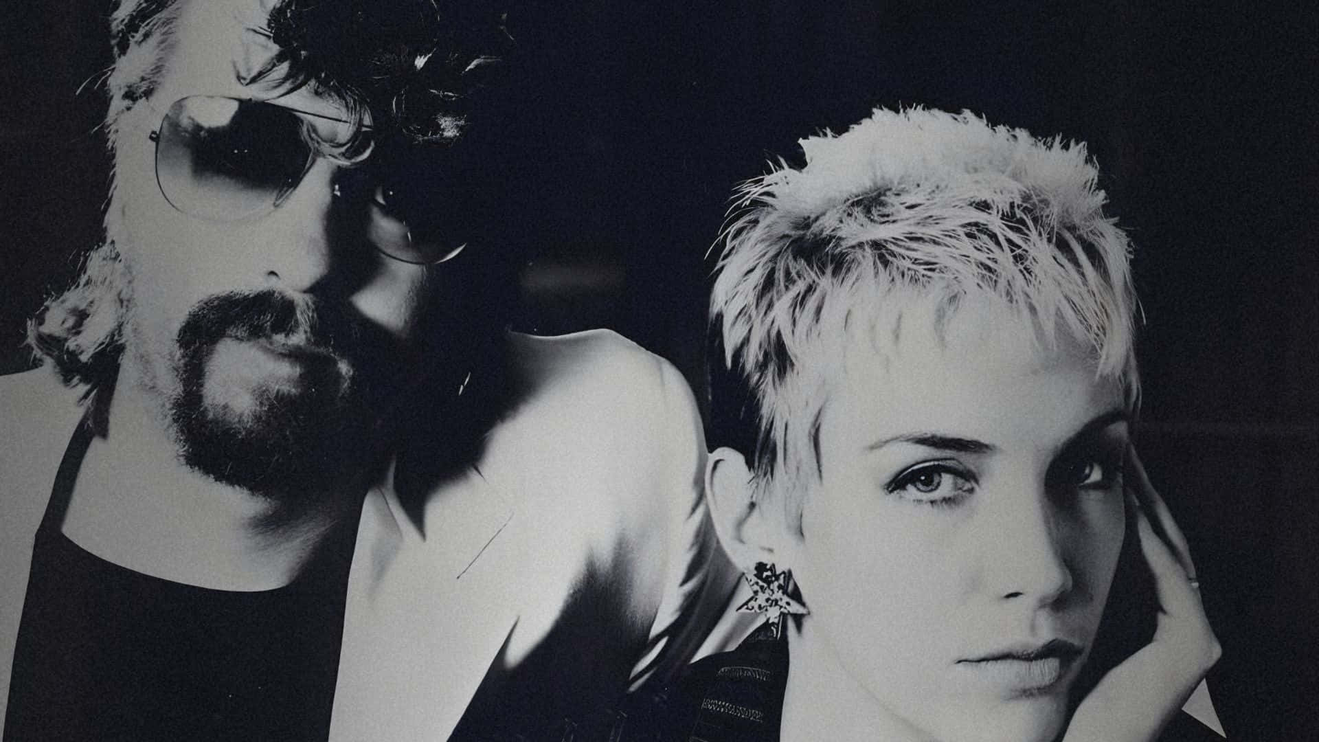 Eurythmics, man with sunglasses and beard, woman with short spiky hair and star earring, Full HD Desktop Wallpaper