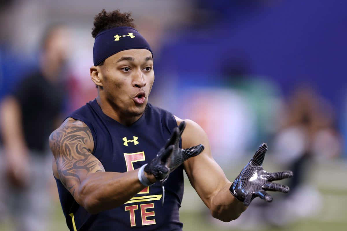 Evan Engram, navy blue uniform, gold accents, SD Desktop Wallpaper