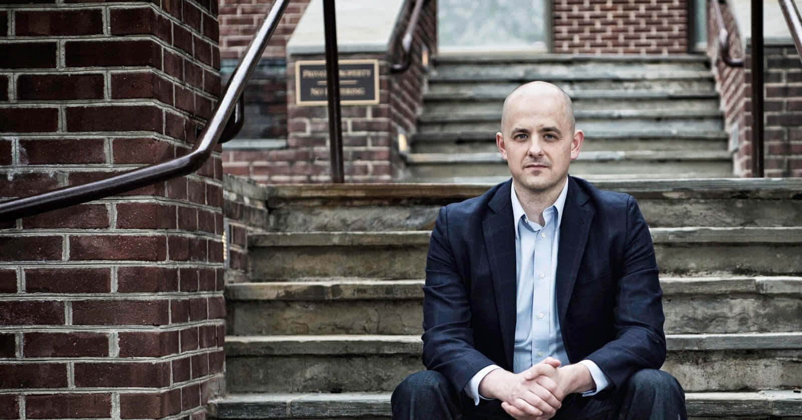 Evan McMullin, dark suit, weathered stone steps, HD Desktop Wallpaper