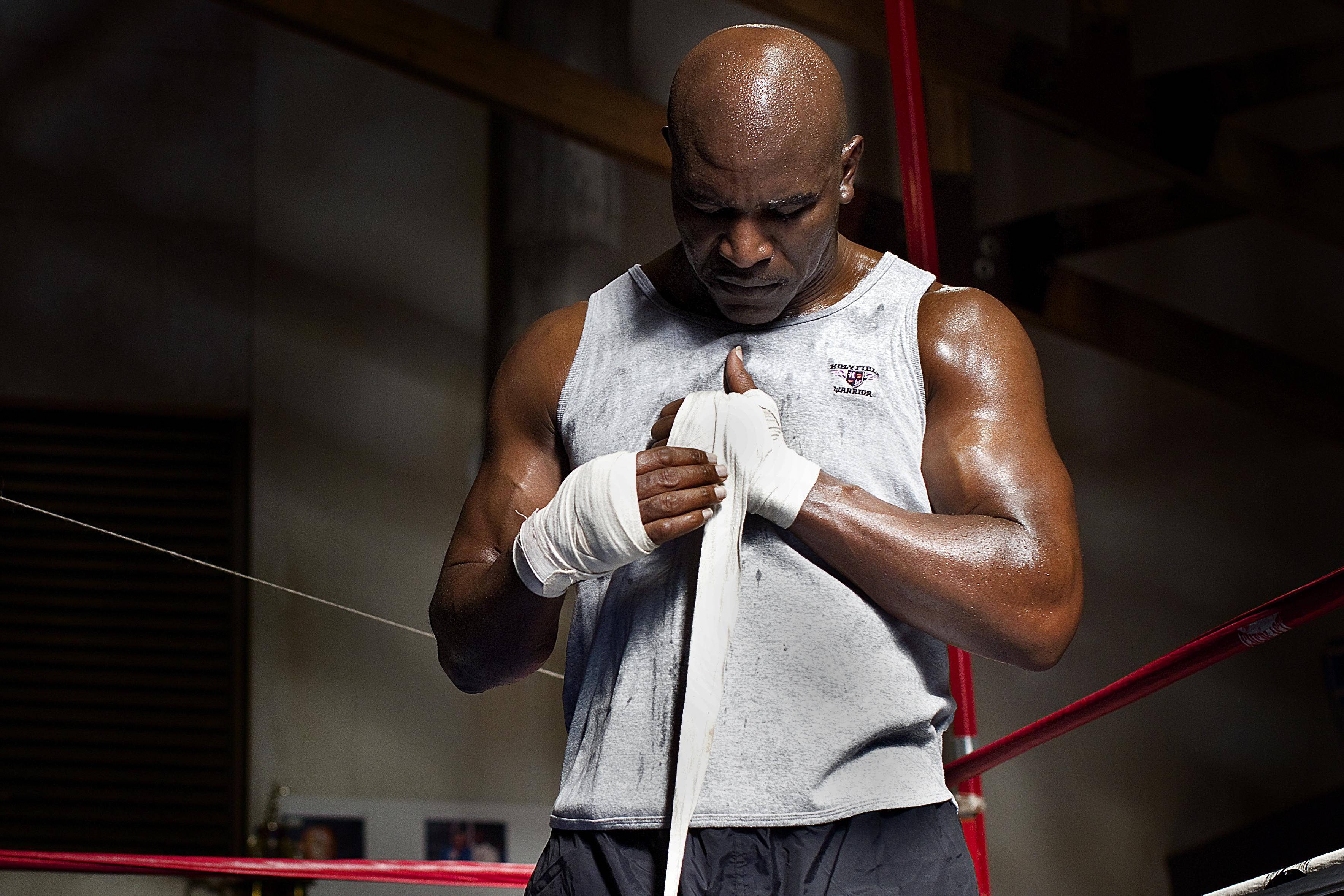 Evander Holyfield, hand wrap, muscular bald boxer, 2K Desktop Wallpaper