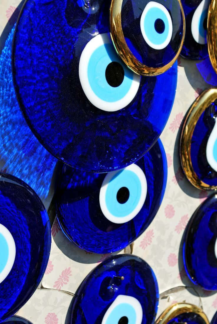 Evil Eye iPhone, cobalt blue, gold rims, SD Phone Wallpaper