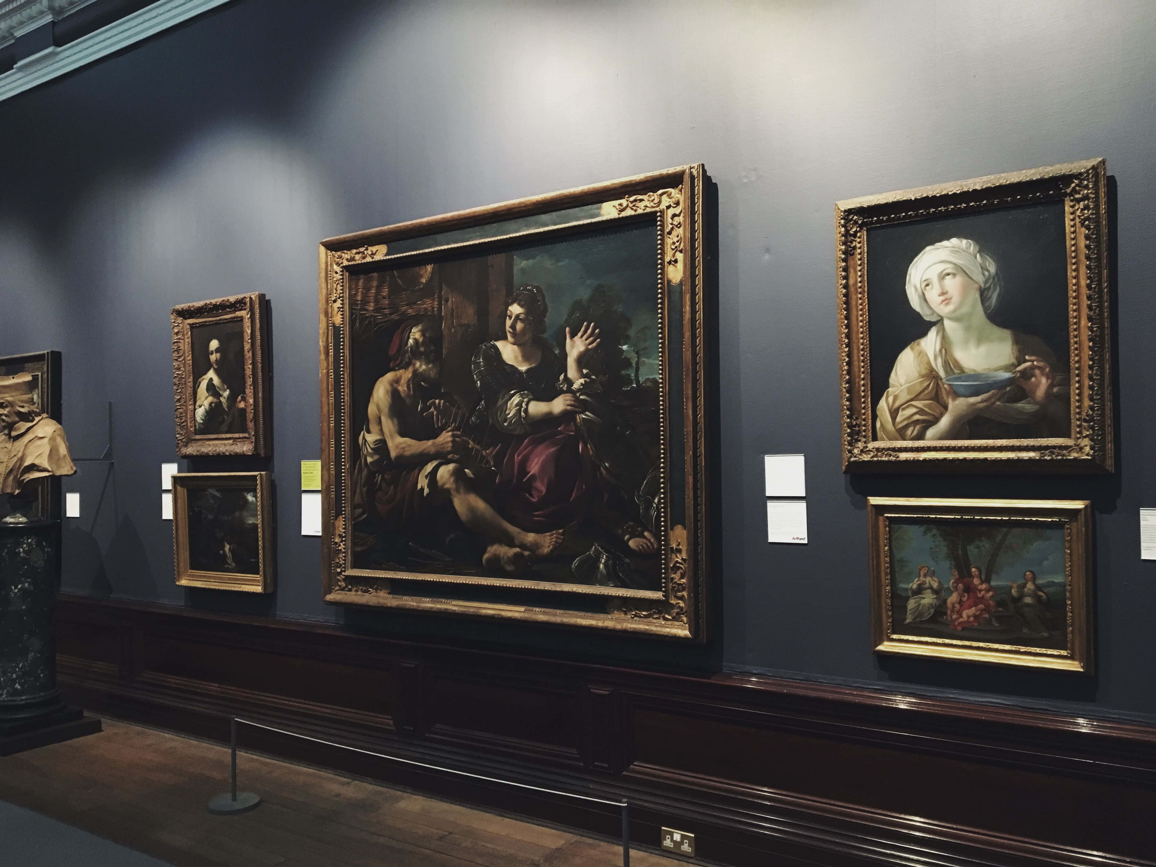 classical paintings, ornate gold frames, dark blue gallery wall, 4K Desktop Wallpaper