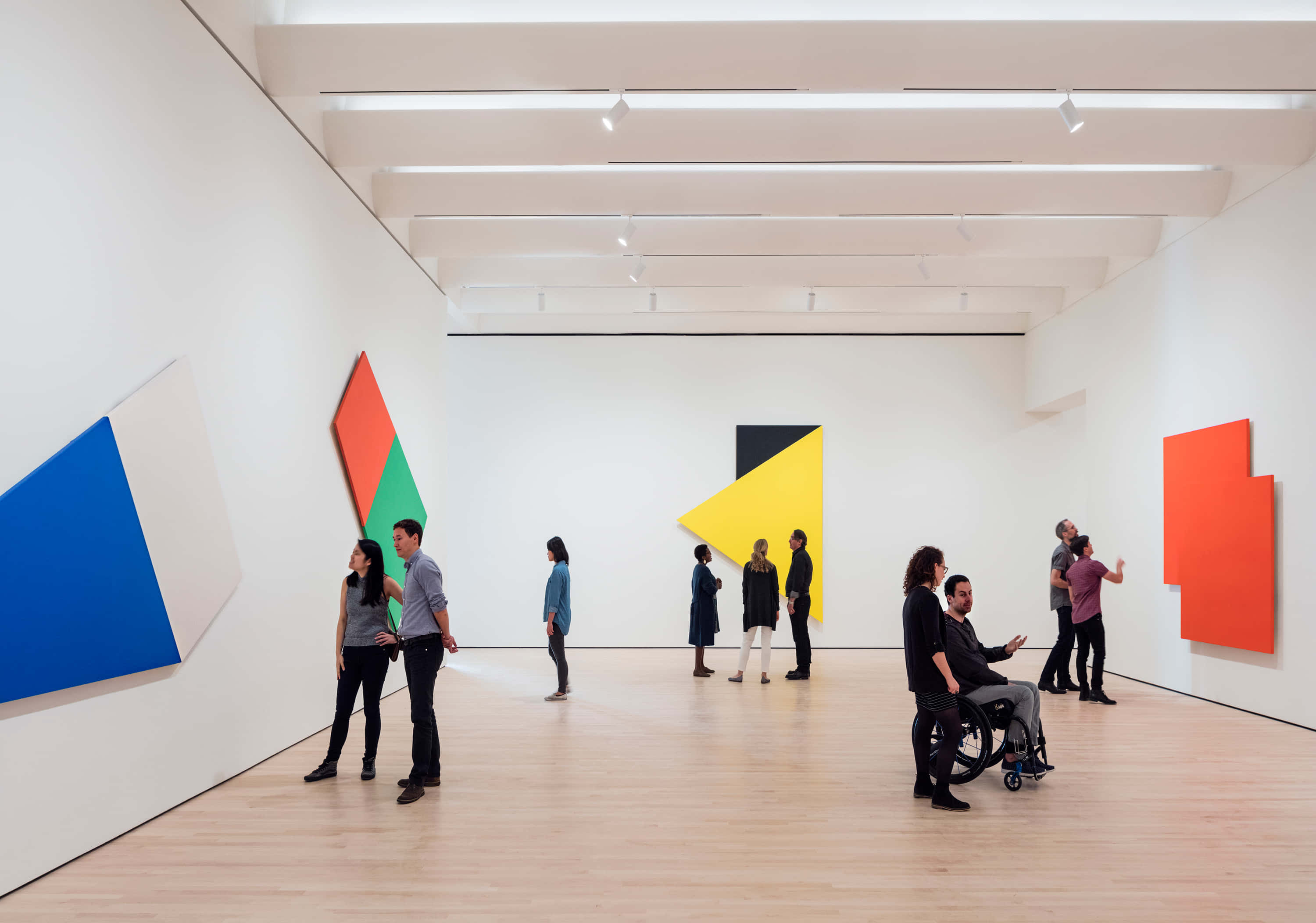 modern art gallery, bold geometric color block artworks, bright minimalist, 2K Desktop Wallpaper