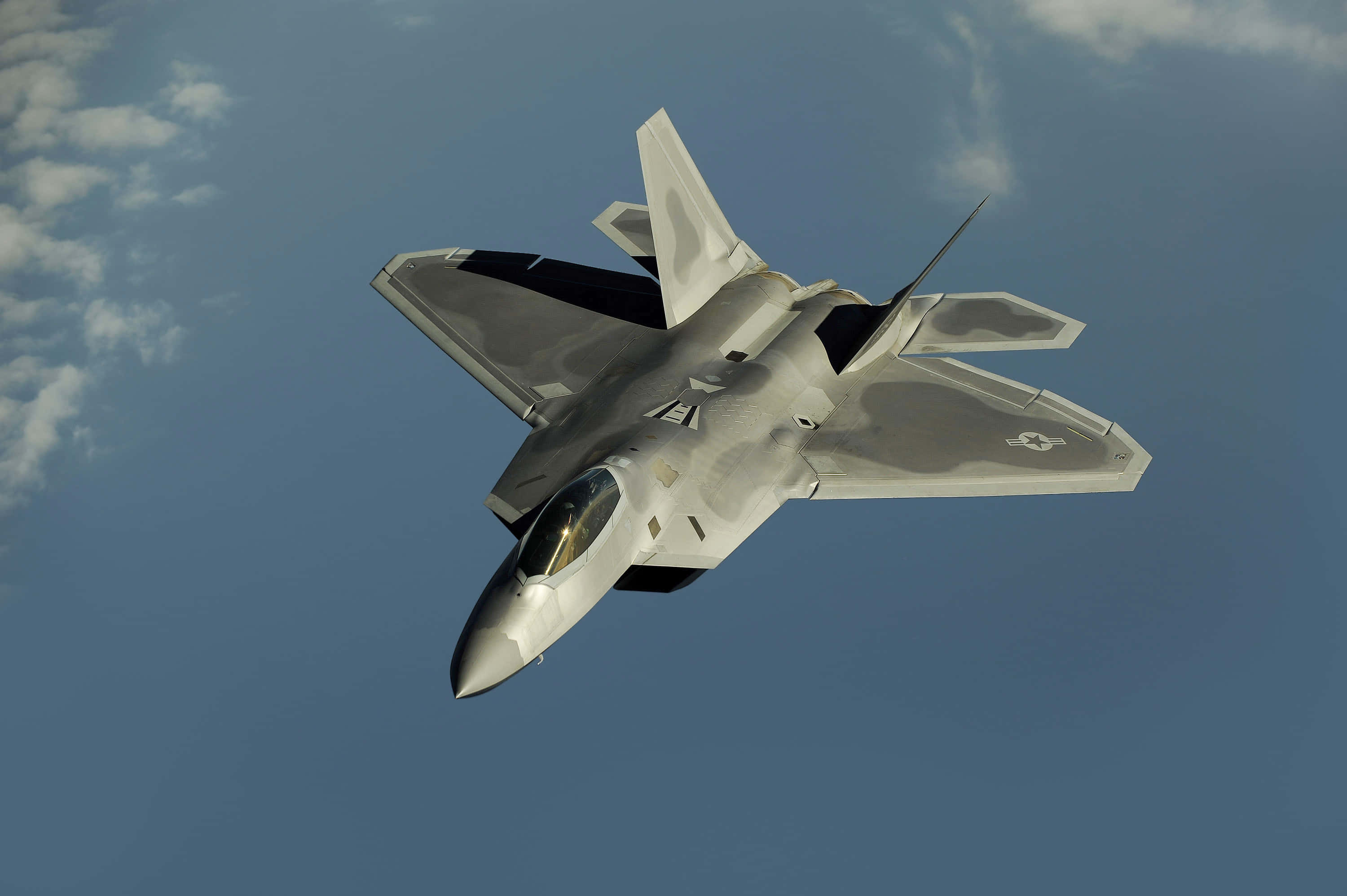 F-22 Raptor, sleek gray, clear blue sky, 2K Desktop Wallpaper
