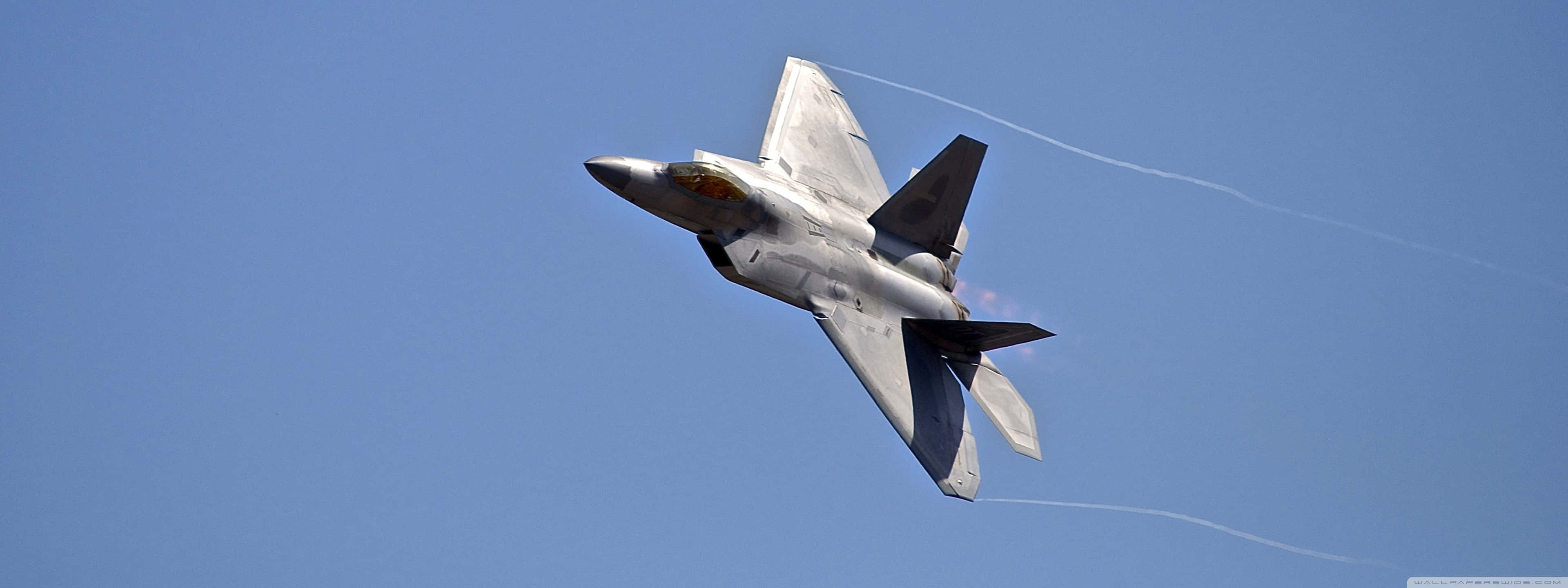 F-22 Raptor, sleek gray, clear blue sky, 4K Desktop Wallpaper