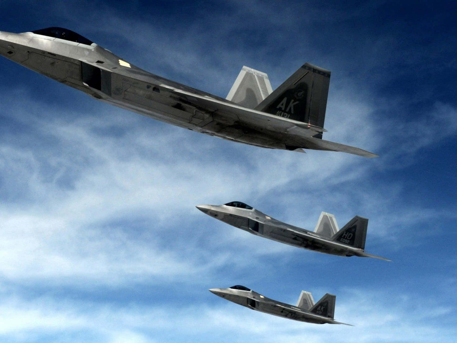 F-22 Raptor, sleek gray fighter jets, vibrant blue sky, Full HD Desktop Wallpaper