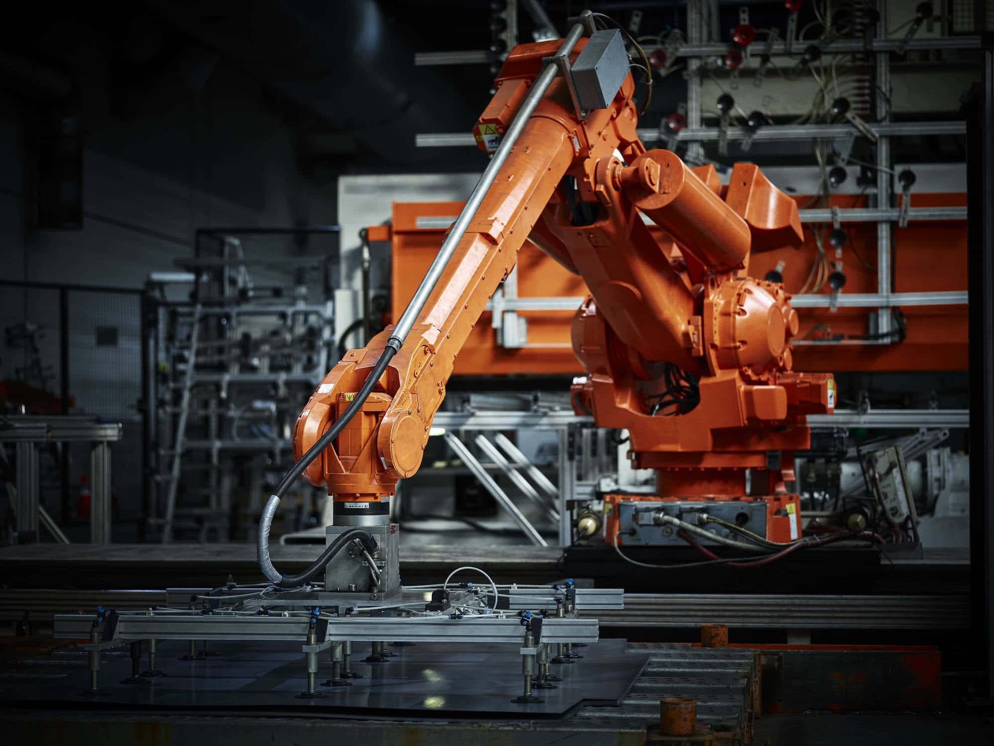 manufacturing 1999, Modern Manufacturing Facility, bright orange industrial robot arm, Full HD Desktop Wallpaper