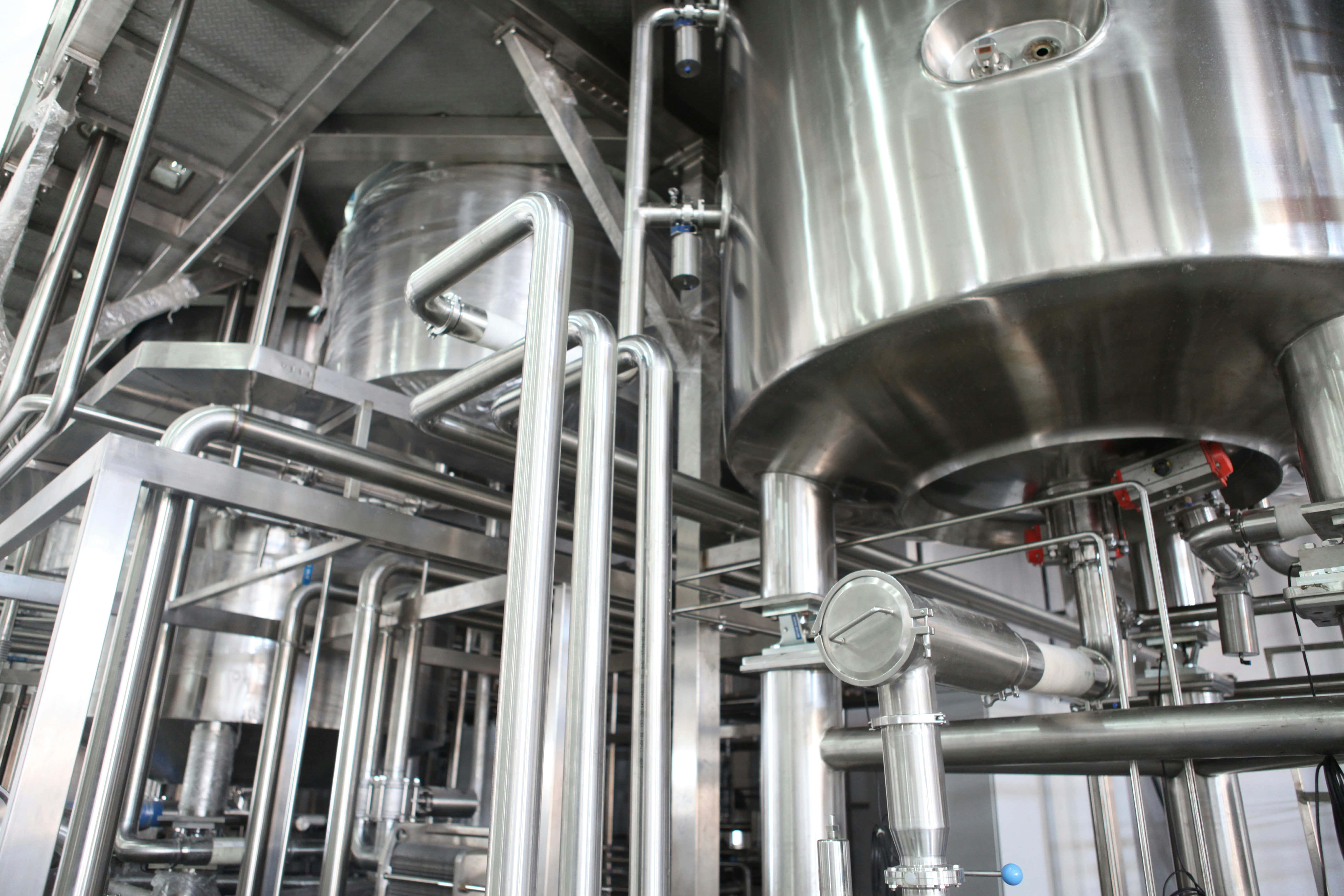 industrial brewery interior, gleaming stainless steel tanks, intricate piping, 5K Desktop Wallpaper