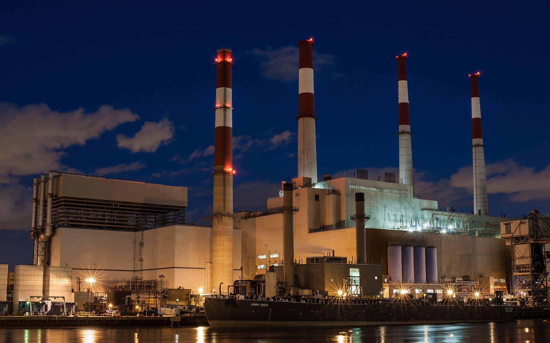 industrial power plant, four red and white smokestacks, deep blue night sky, Full HD Desktop Wallpaper