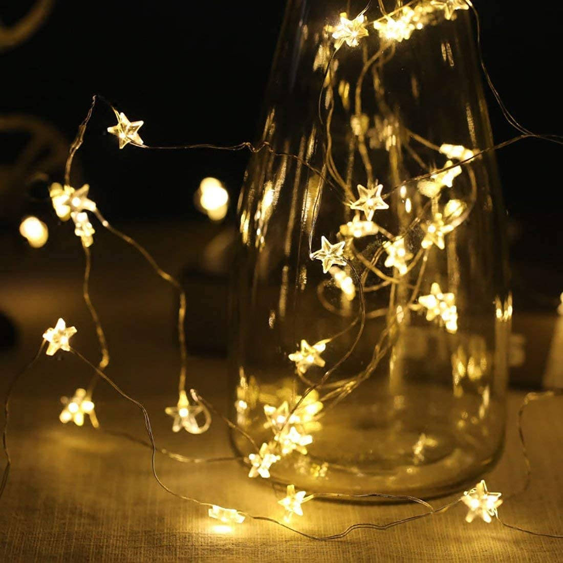 star-shaped fairy lights, glass vase, warm glowing, SD Desktop Wallpaper