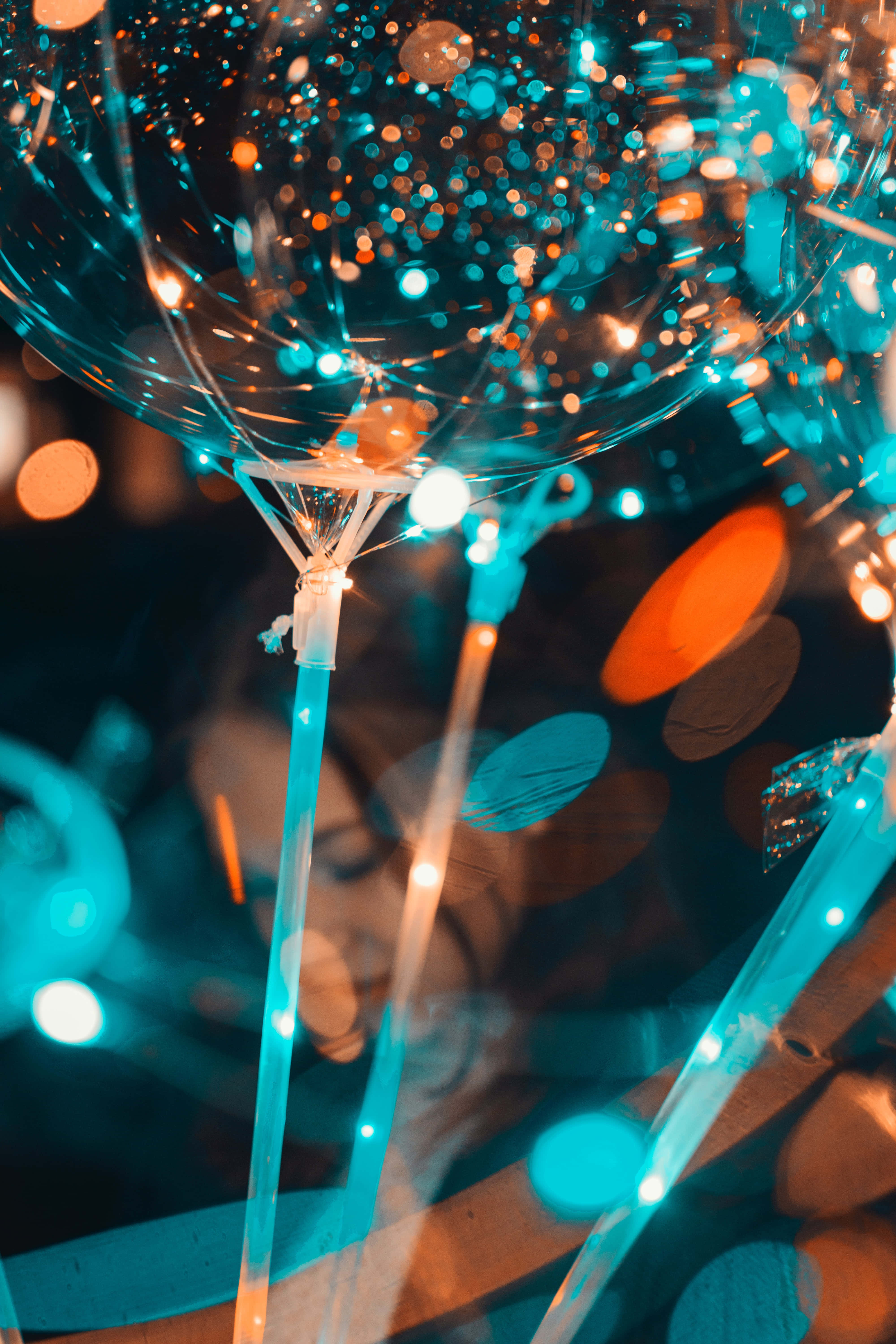 enchanted lights celebration, glowing teal balloons, glitter, 5K Phone Wallpaper