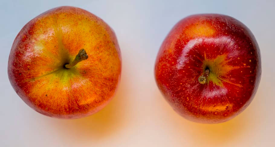 glossy red apples, yellow blush, soft white surface, SD Desktop Wallpaper