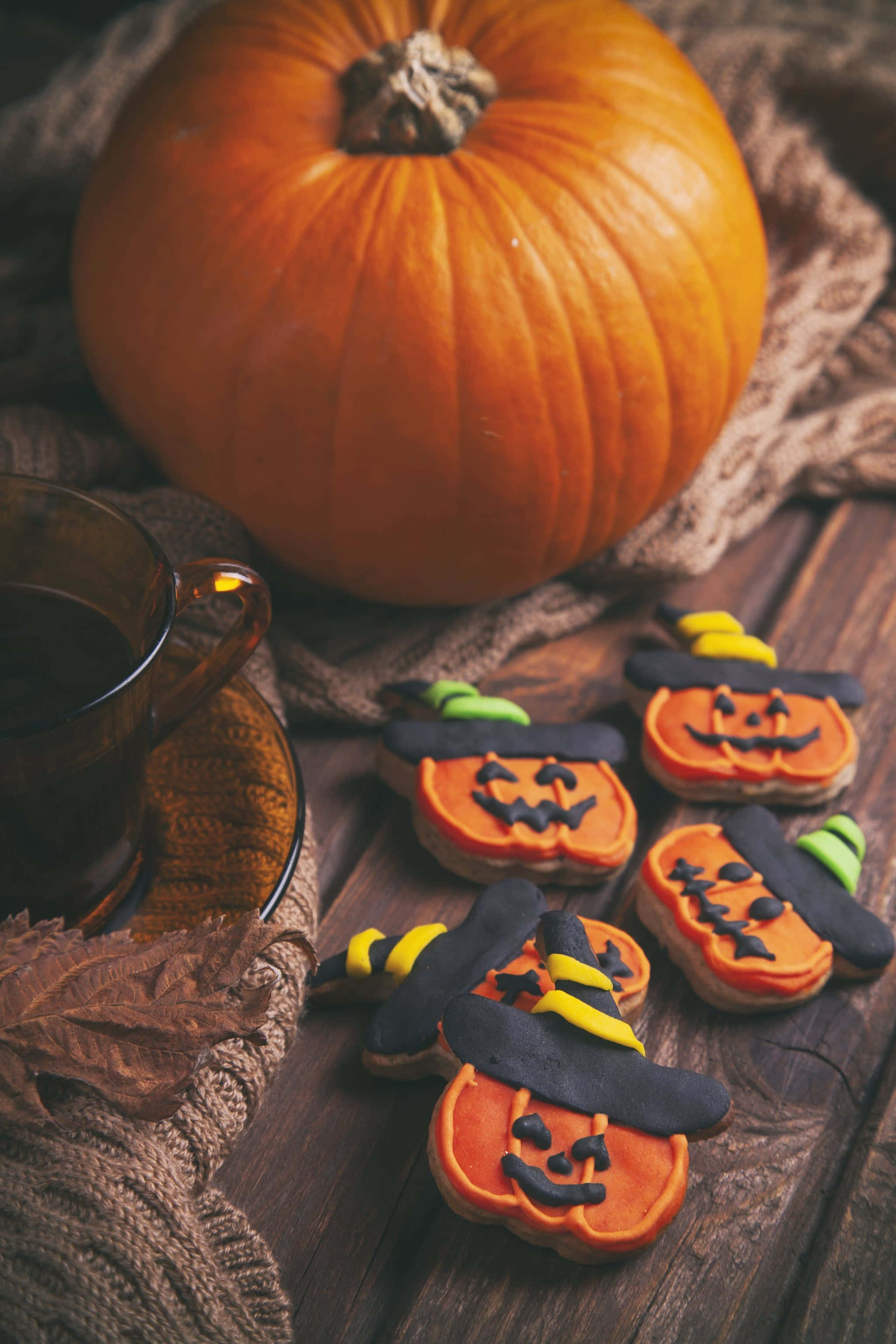 iPhone, spooky Fall themed, rustic wooden table, 2K Phone Wallpaper