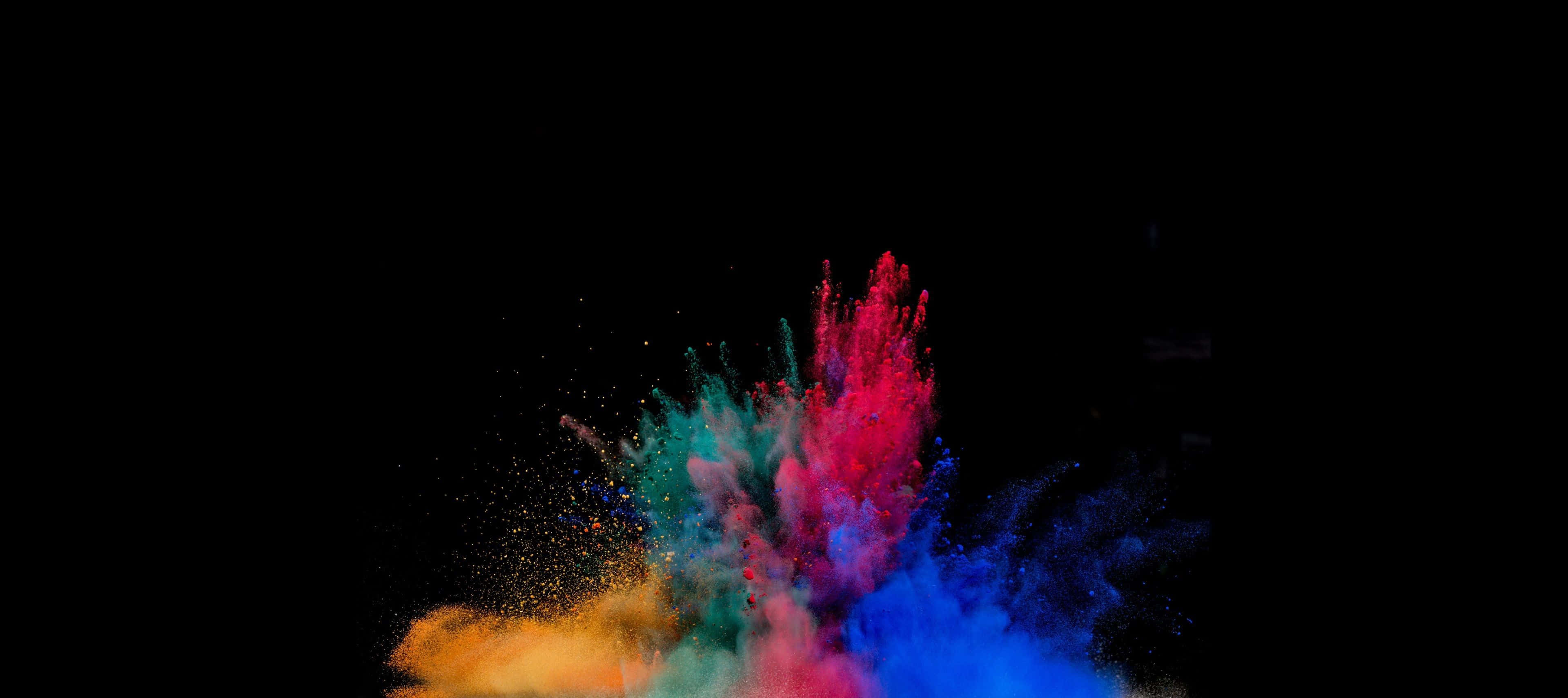 AMOLED Laptop, Vibrant colored powder, pure black background, 4K Desktop Wallpaper