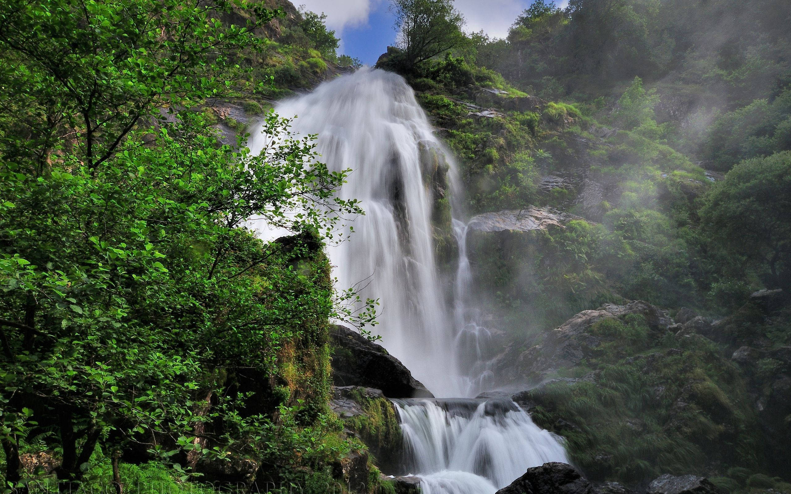 mountain waterfall, lush green forest, mist, 2K Desktop Wallpaper