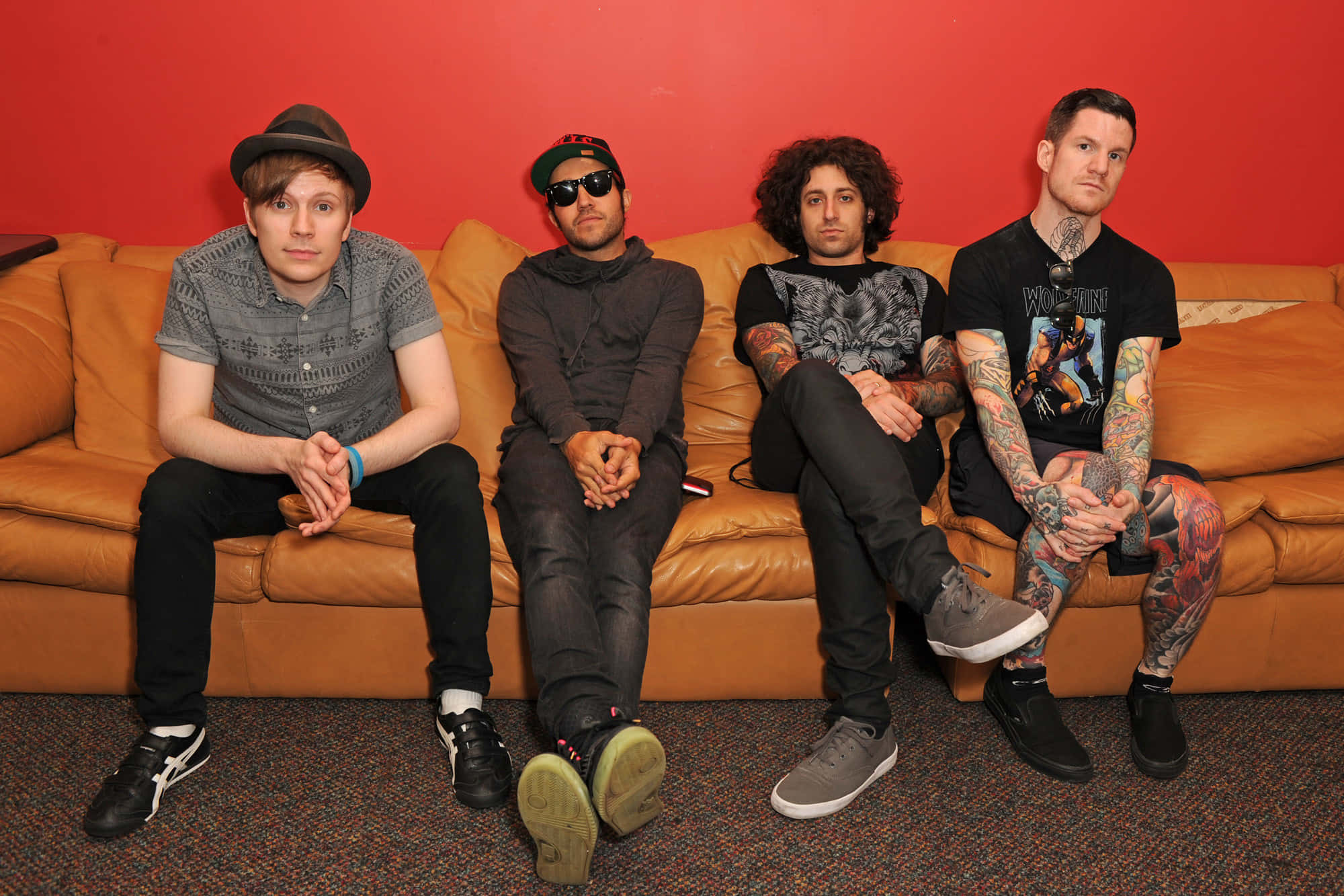 Fall Out Boy, tan leather couch, bold red wall, Full HD Desktop Wallpaper