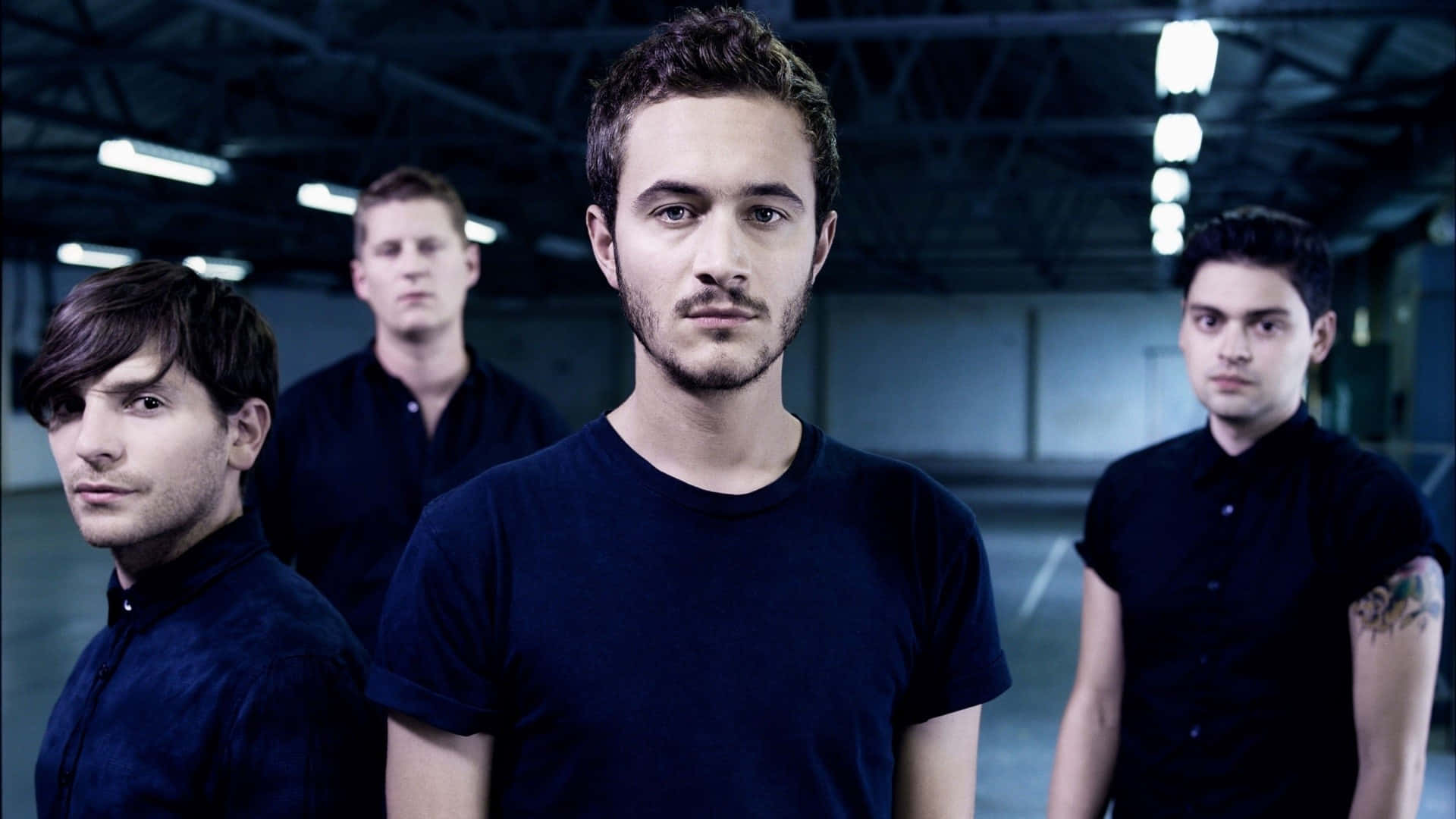 Fall out boy, black shirts, dimly lit industrial garage, Full HD Desktop Wallpaper