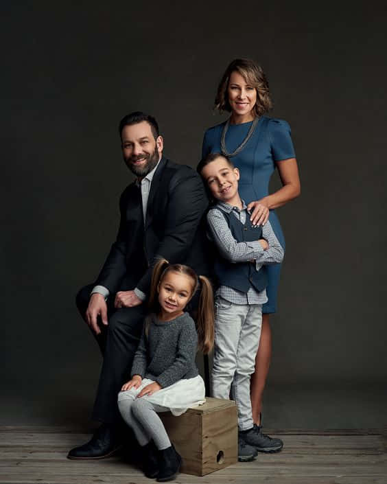 family of four, studio, dark gray backdrop, SD Phone Wallpaper