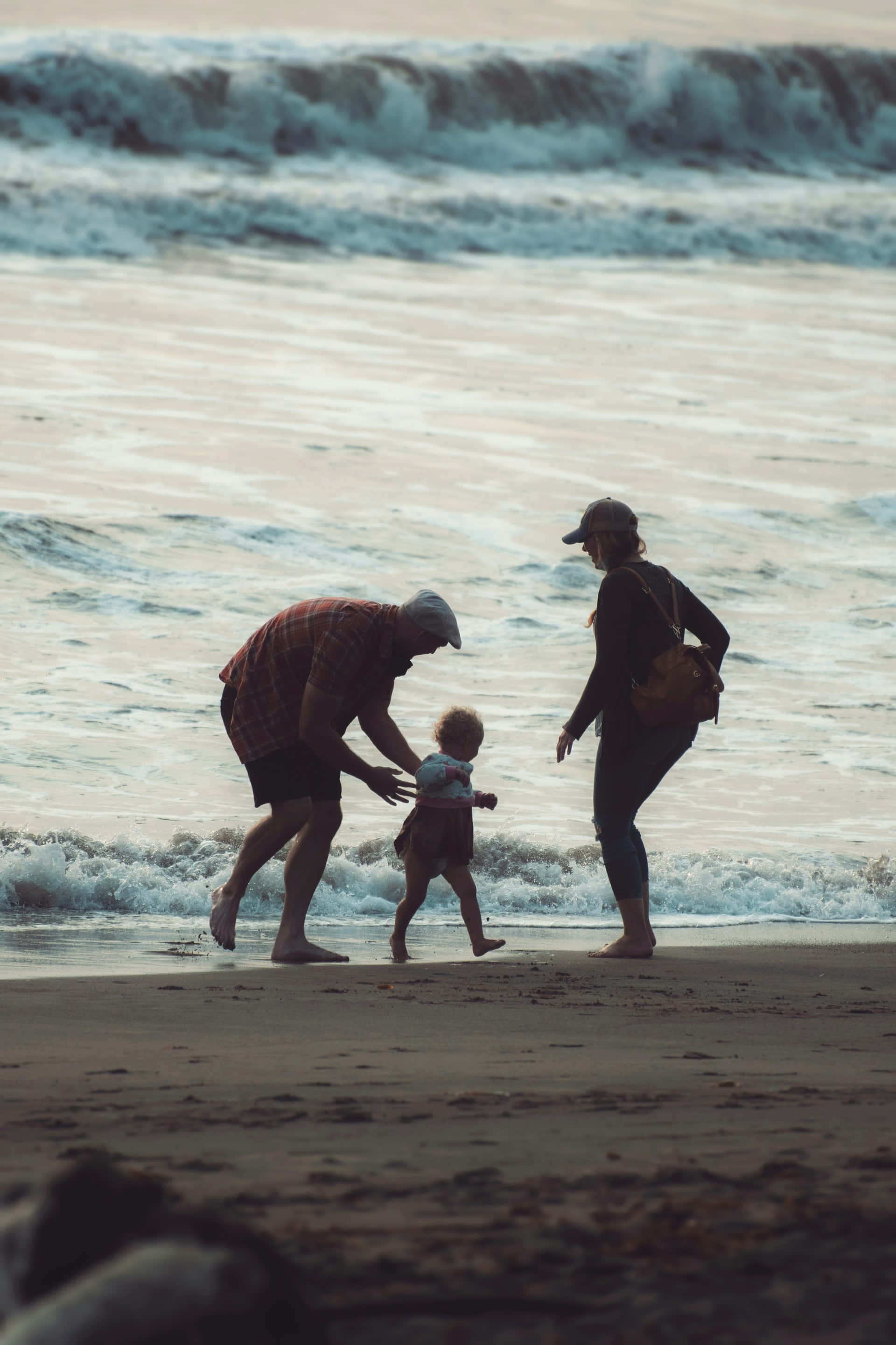 family of three, sandy beach, gentle waves, 2K Phone Wallpaper