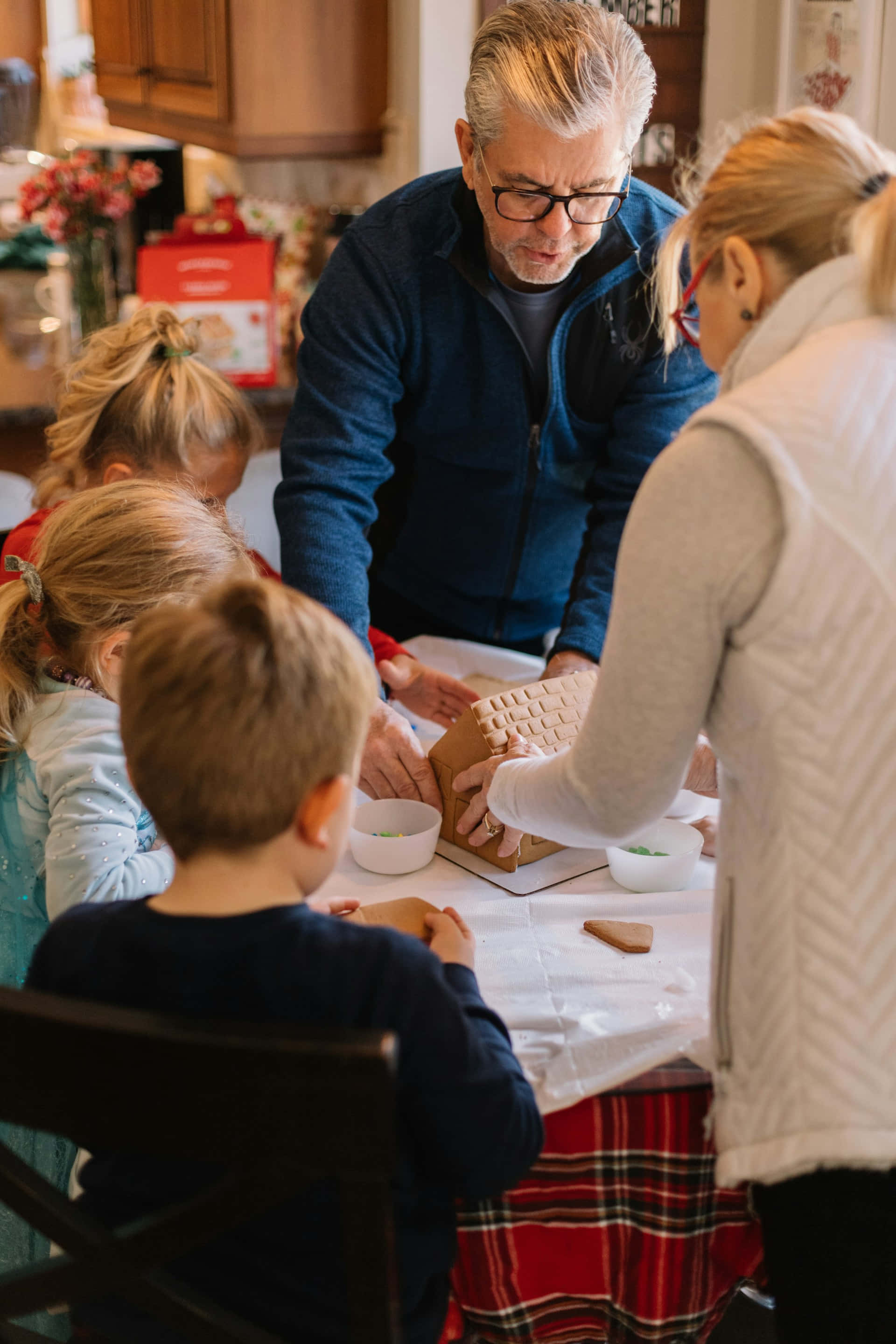 family, gingerbread house, kitchen table, 2K Phone Wallpaper