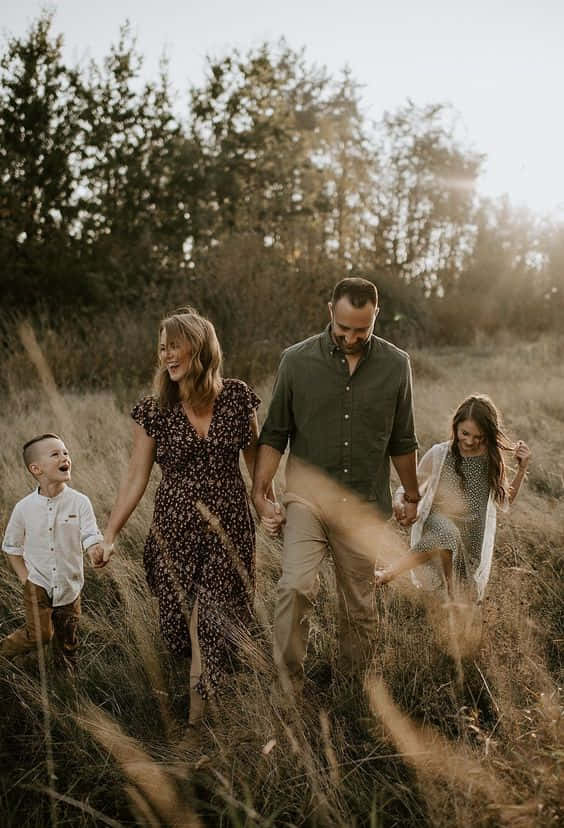 family of five, golden grass, sunset, SD Phone Wallpaper