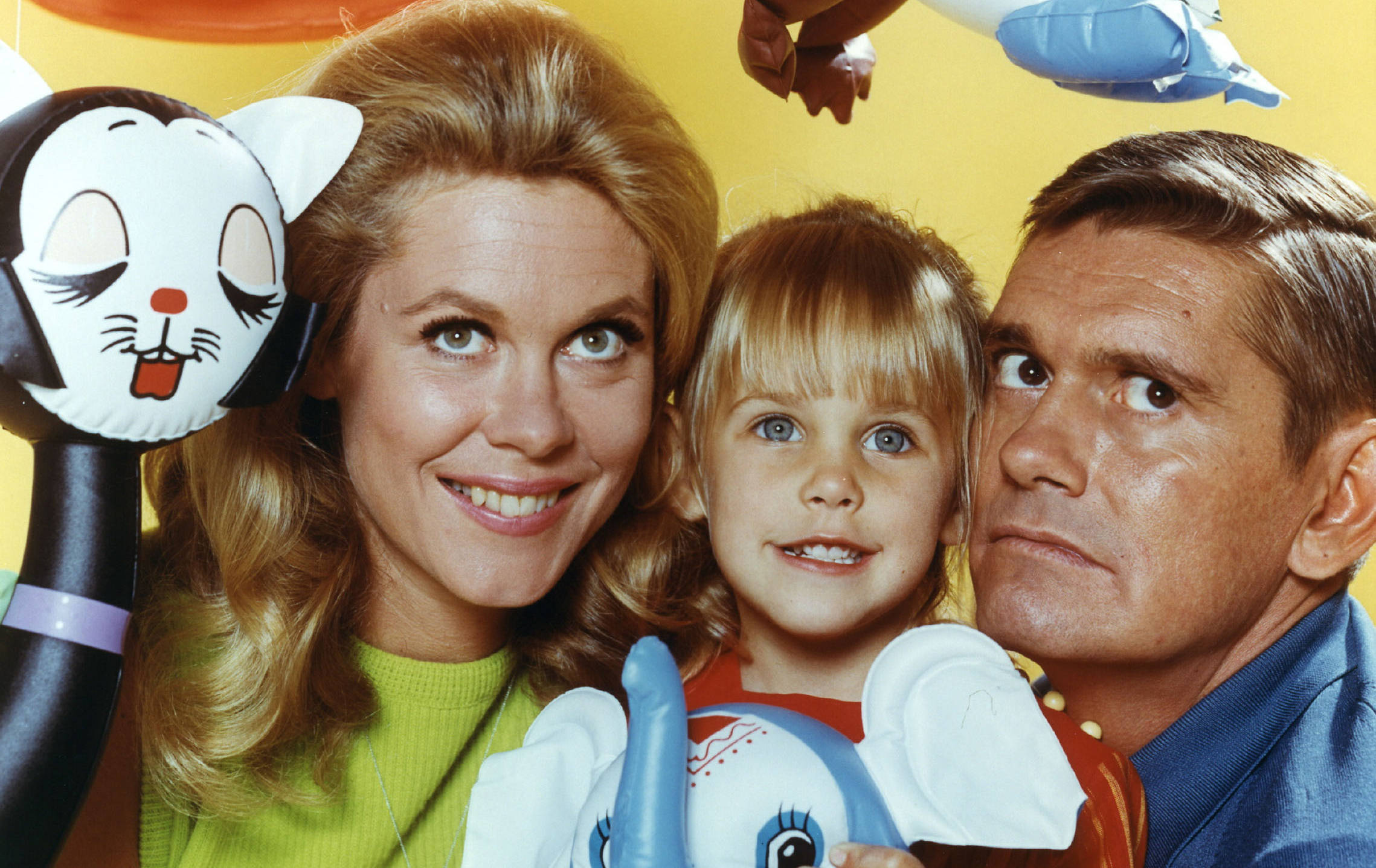 Bewitched Adorable Family, inflatable toys, bright yellow background, Full HD Desktop Wallpaper