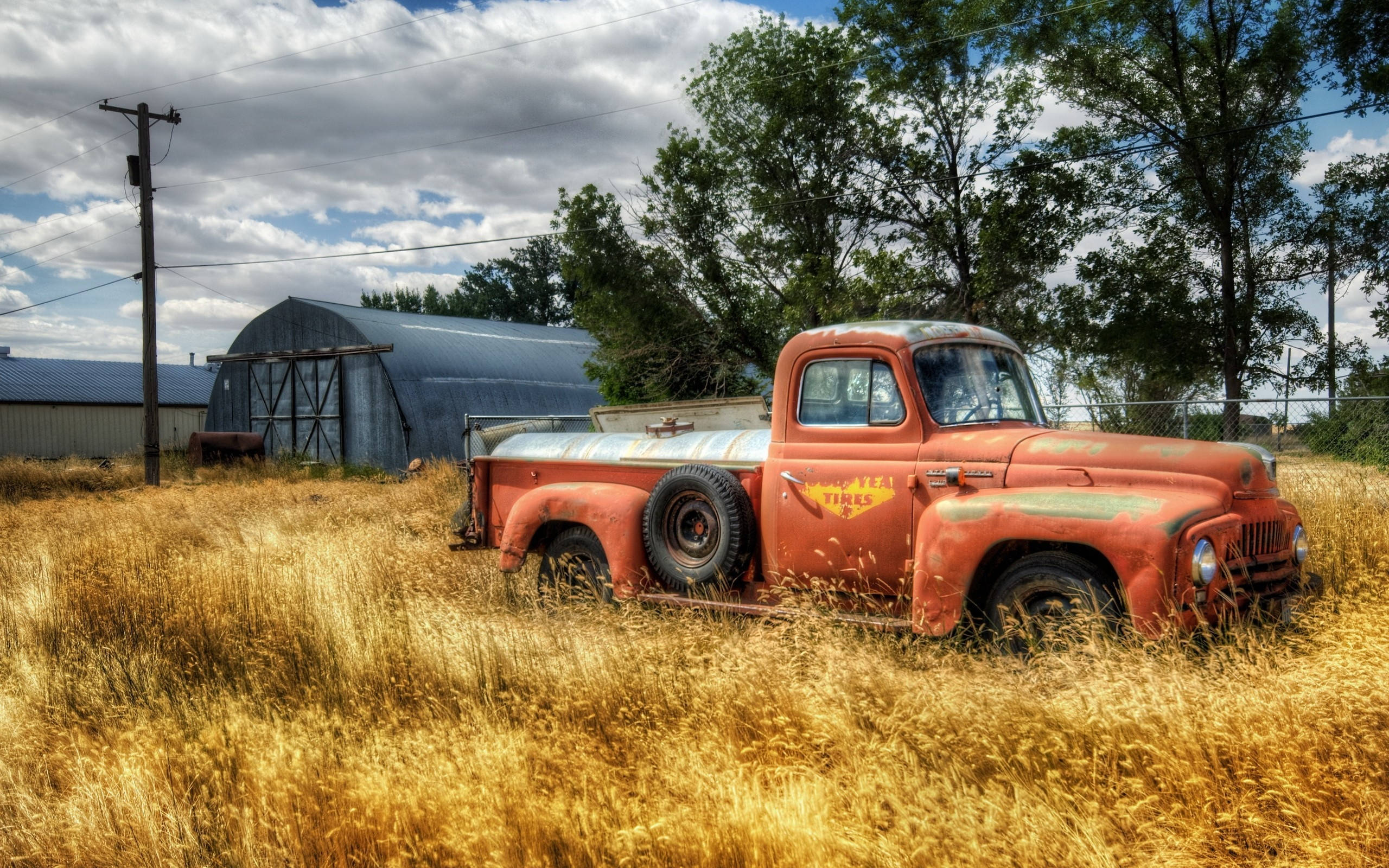 vintage orange pickup truck, abandoned, golden wheat field, 2K Desktop Wallpaper