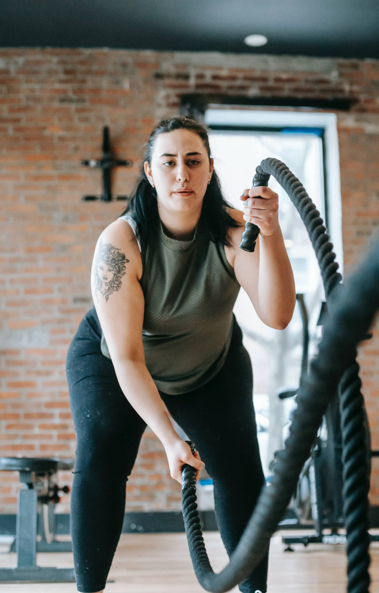 Fat Girl, battles ropes, rustic brick-walled gym, Full HD Phone Wallpaper