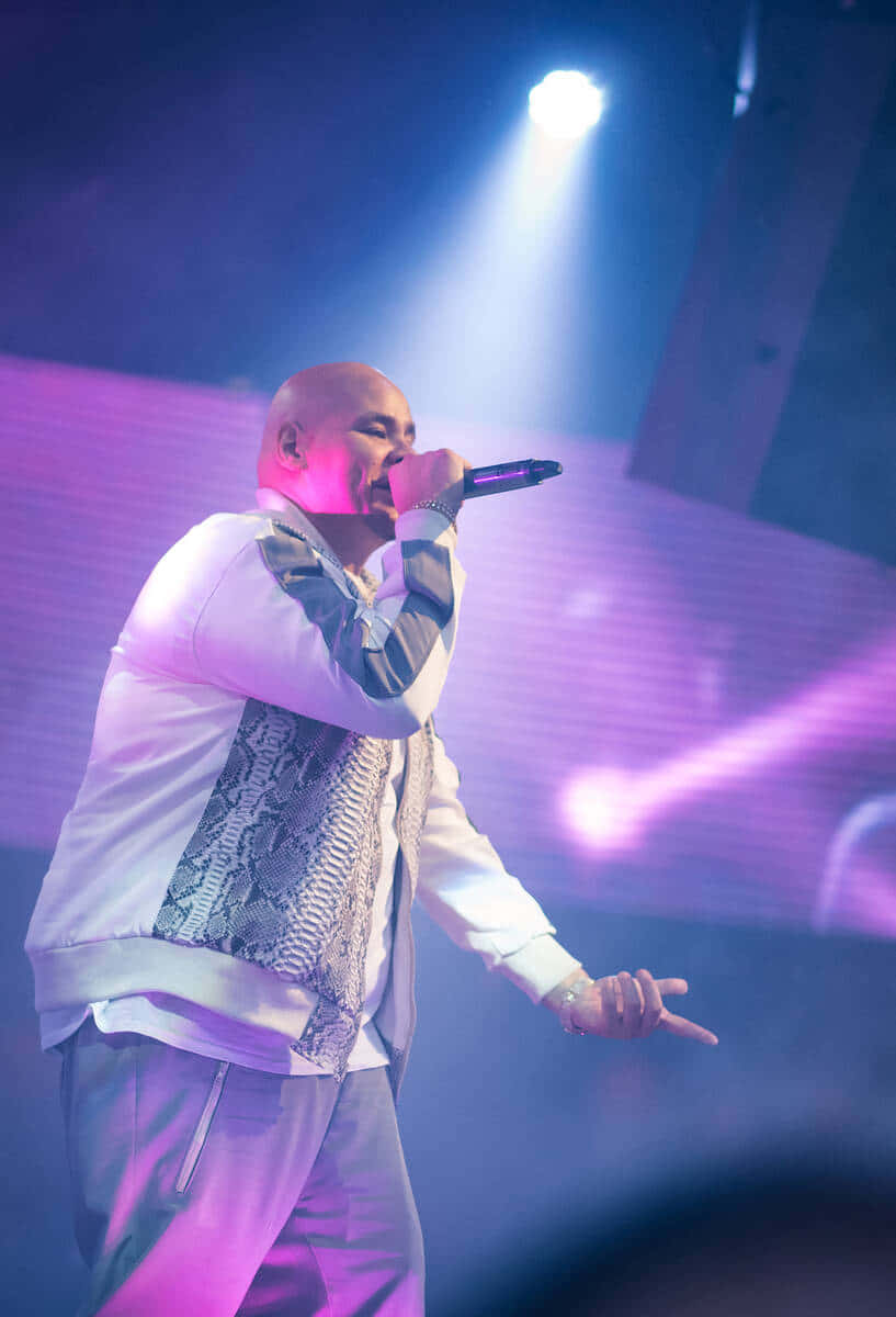 Fat Joe, white jacket with snake print accents, vibrant purple and blue stage lights, SD Phone Wallpaper
