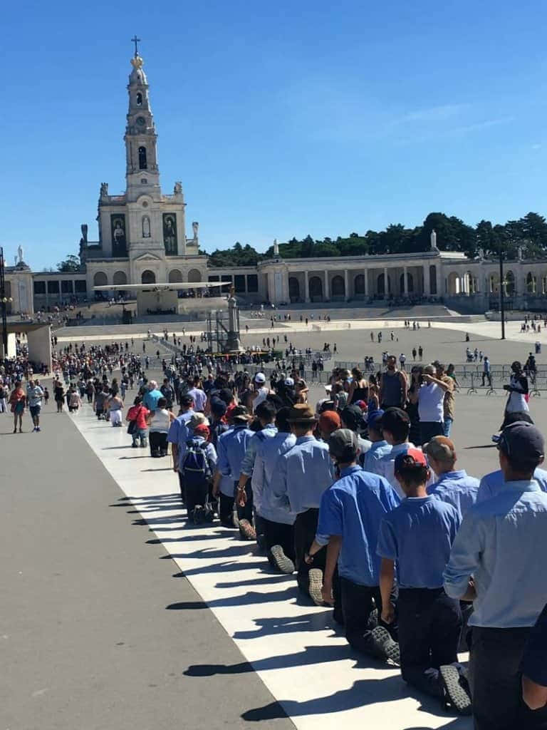 Fatima Sanctuary, blue shirts, paved plaza, SD Phone Wallpaper