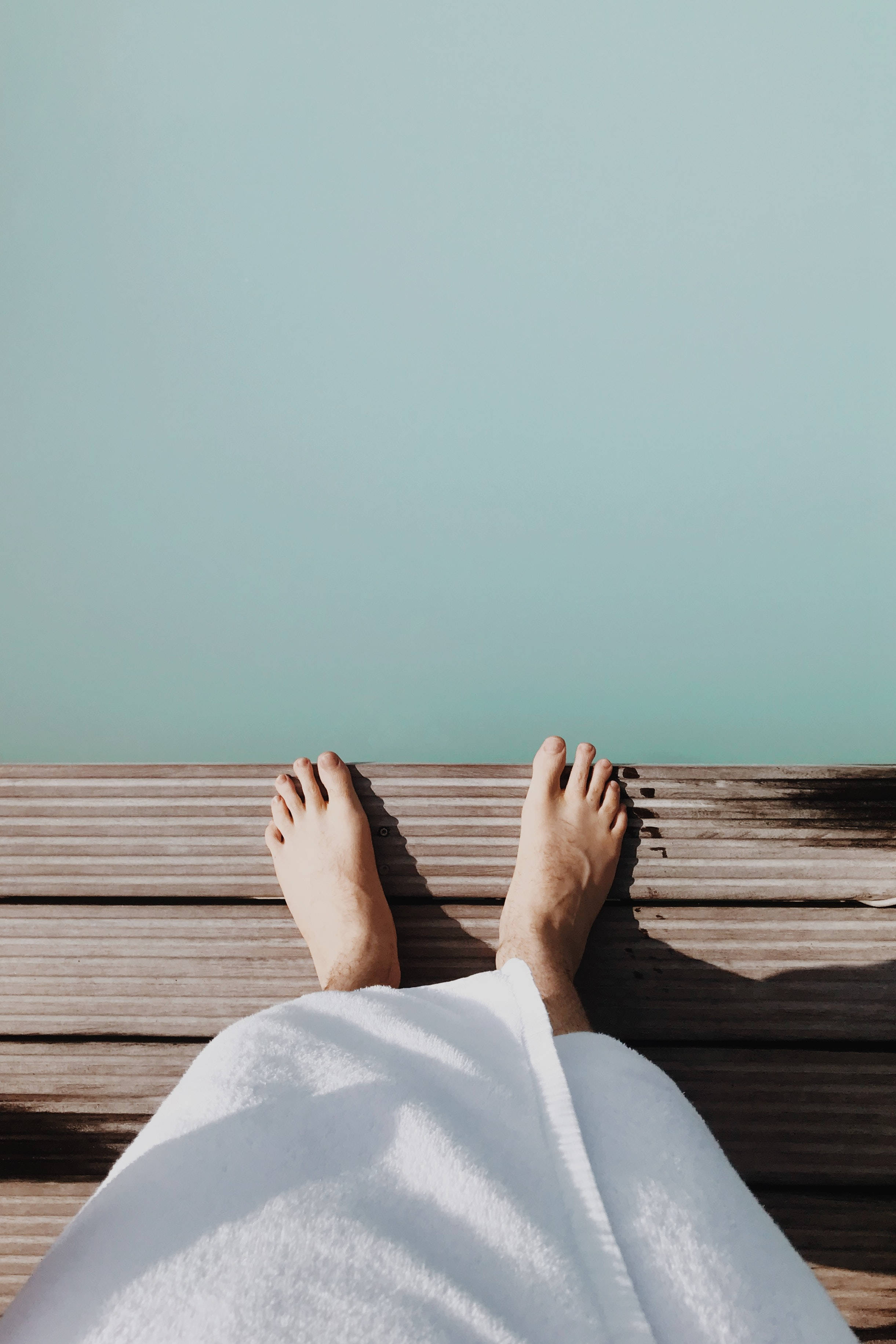 wooden floor, bare feet, turquoise water, 2K Phone Wallpaper