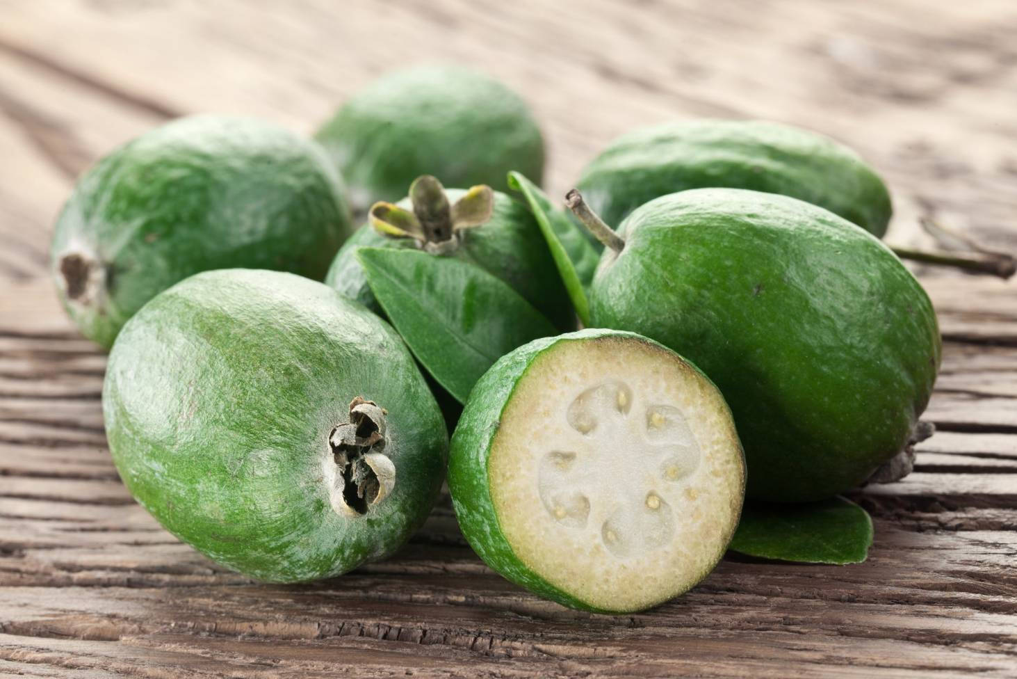 Feijoa, rustic wooden surface, white flesh, HD Desktop Wallpaper