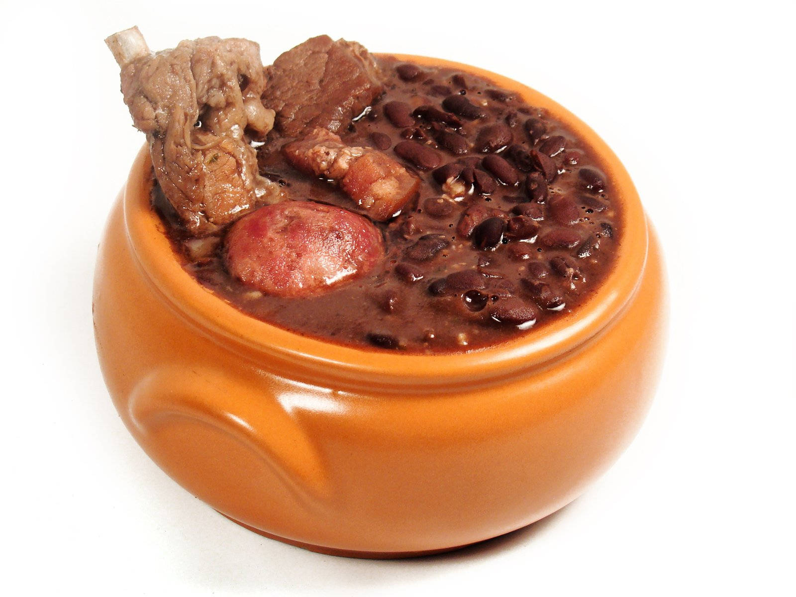 traditional Brazilian feijoada, rustic orange clay bowl, rich dark beans, HD Desktop Wallpaper