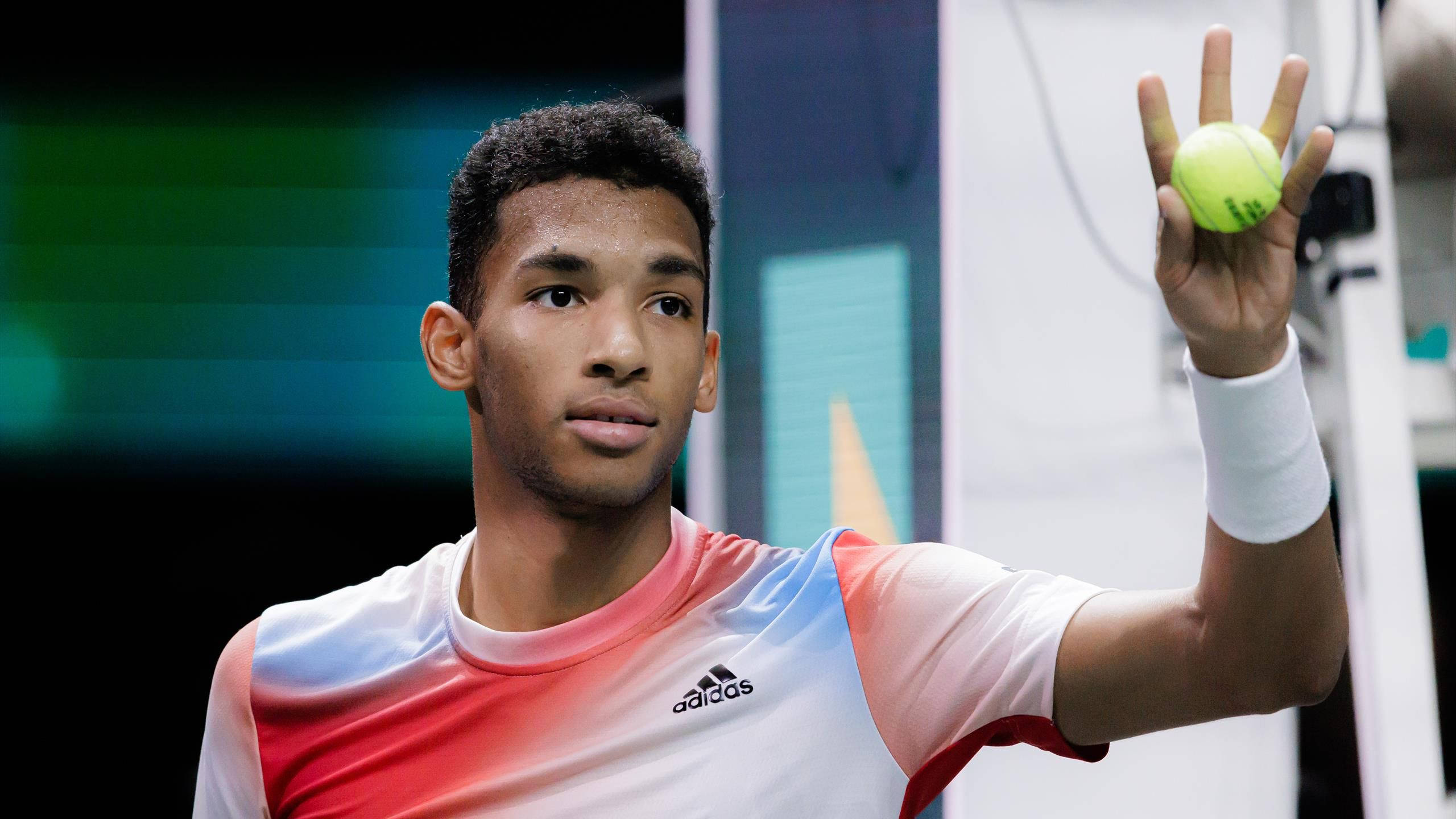 Felix Auger-Aliassime, bright yellow tennis ball, indoor court, 2K Desktop Wallpaper