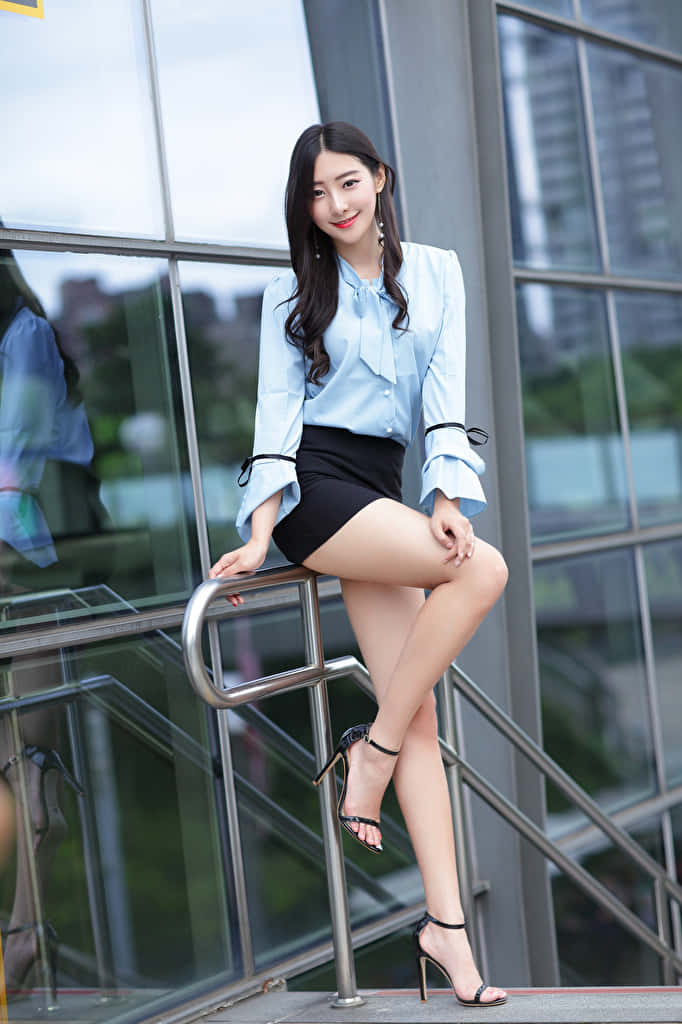 Asian female thighs, light blue blouse, black skirt, SD Phone Wallpaper