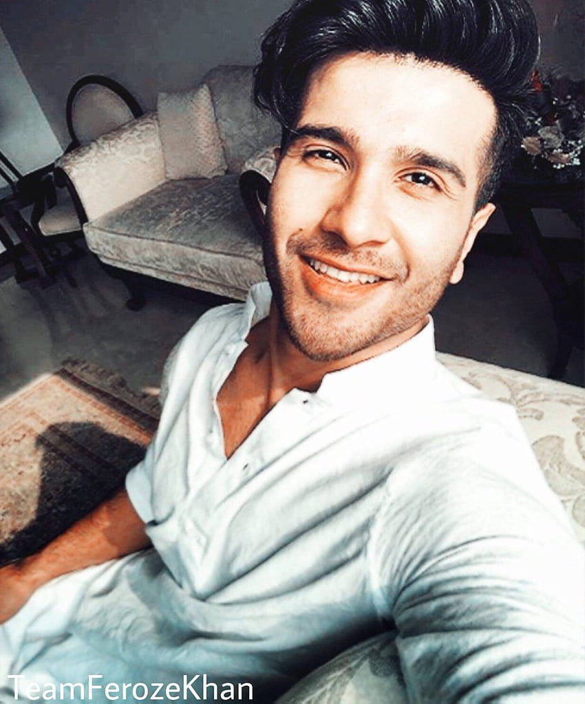 Feroz Khan, light blue shirt, patterned couch, SD Phone Wallpaper